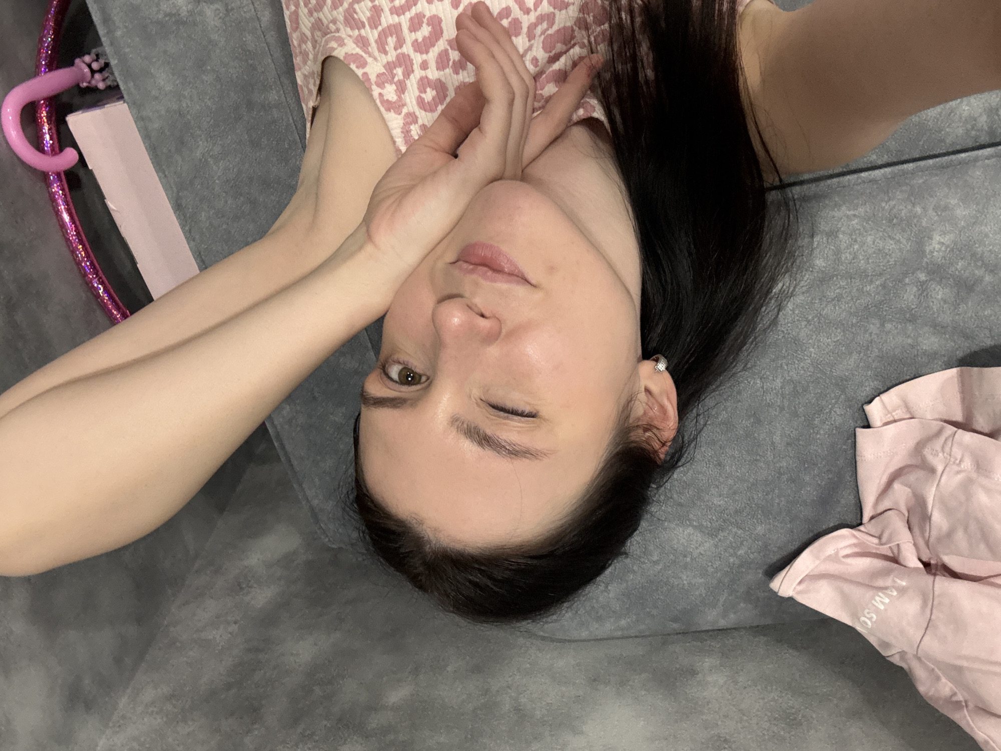 Woman poses for photo on couch in Kazan