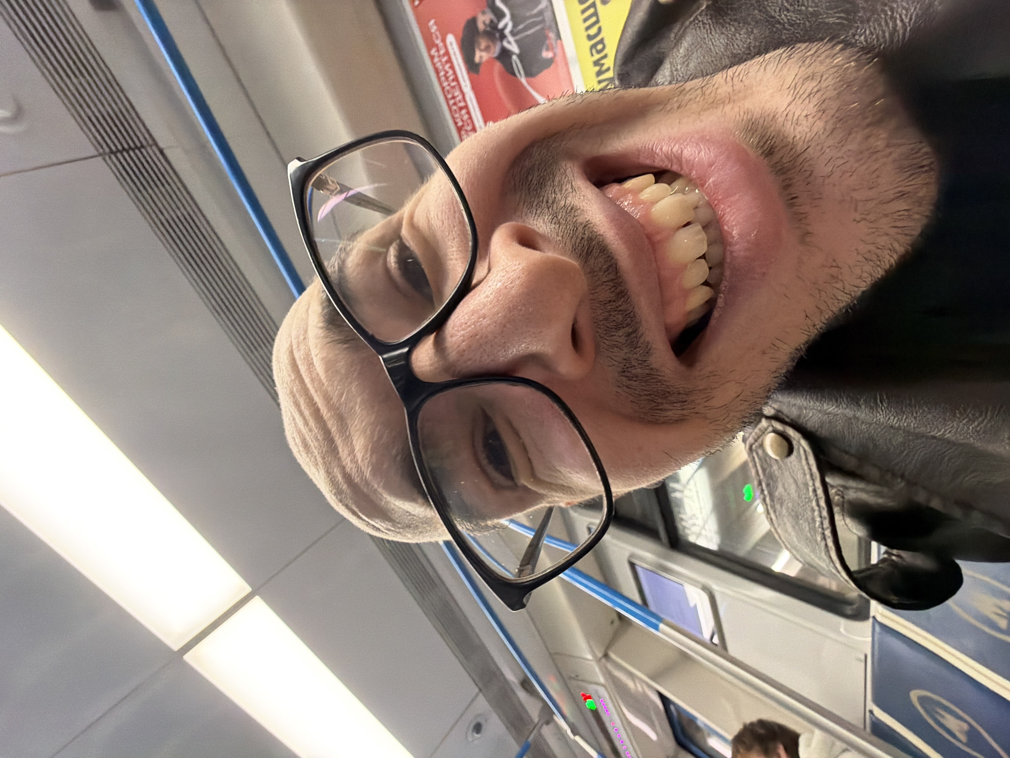 Man photographed on Moscow train in rotated close-up image