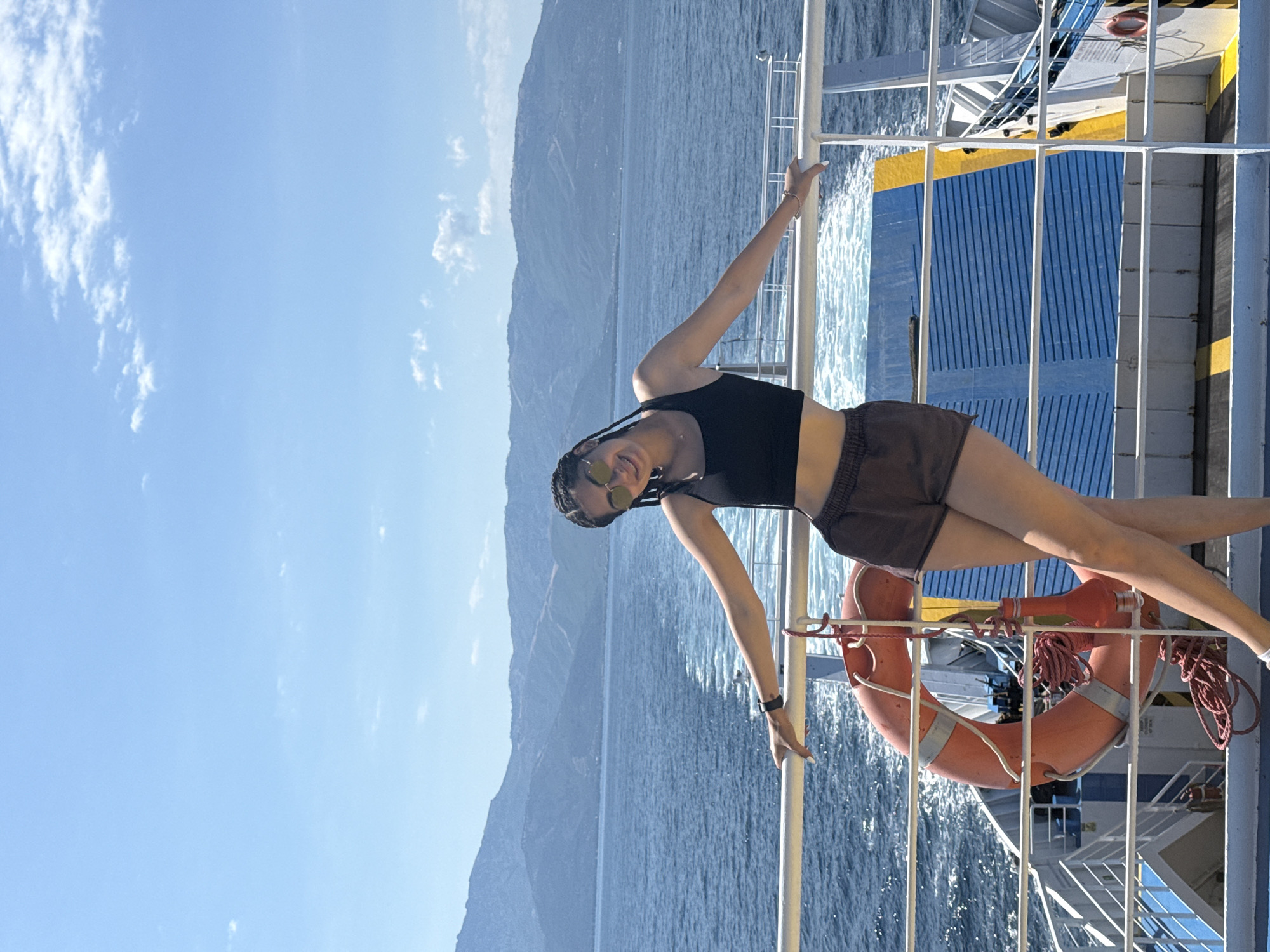Ferry deck poses on the Greek sea