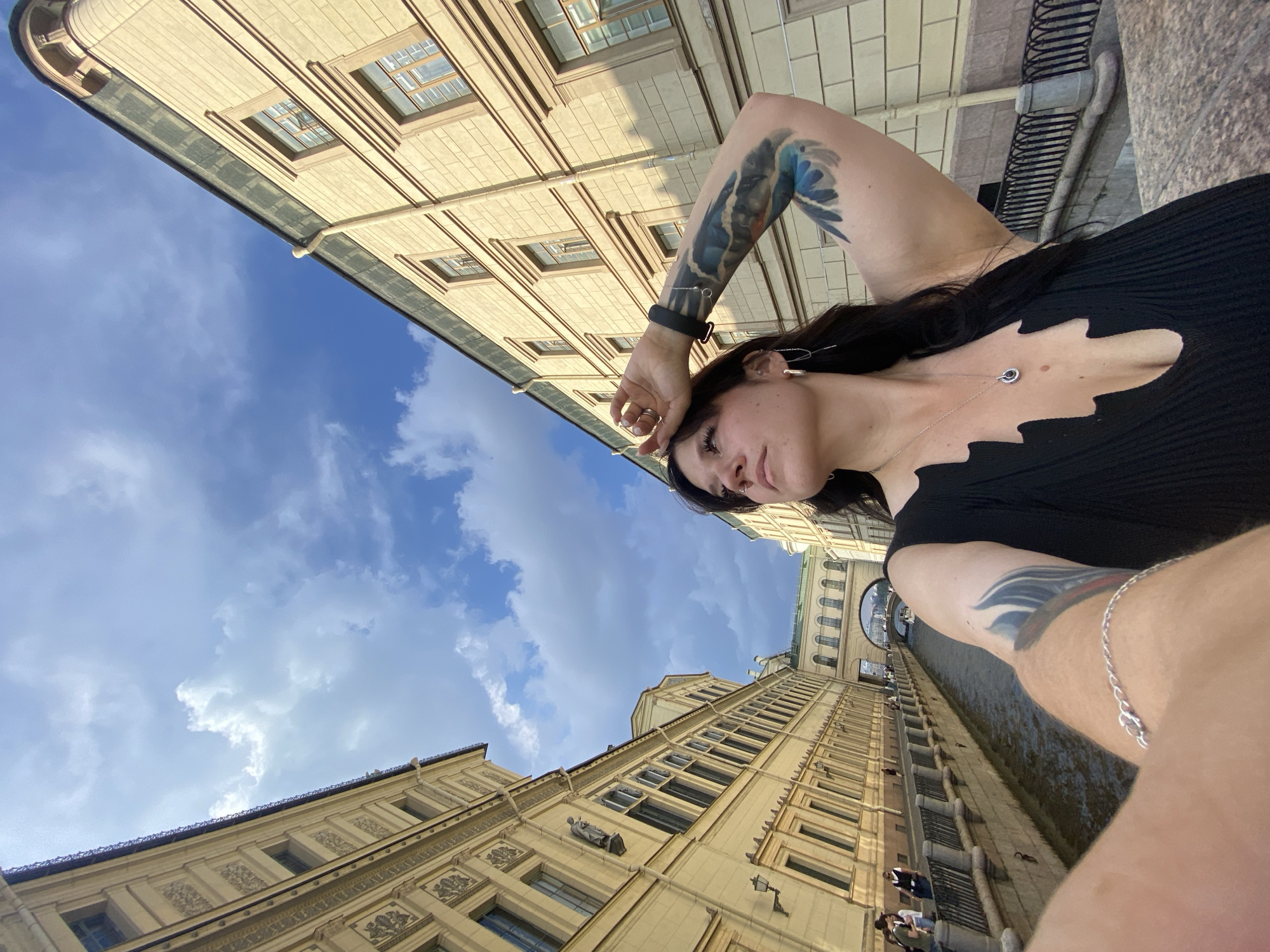 Selfies by the Griboyedov Canal on a sunny St. Petersburg afternoon