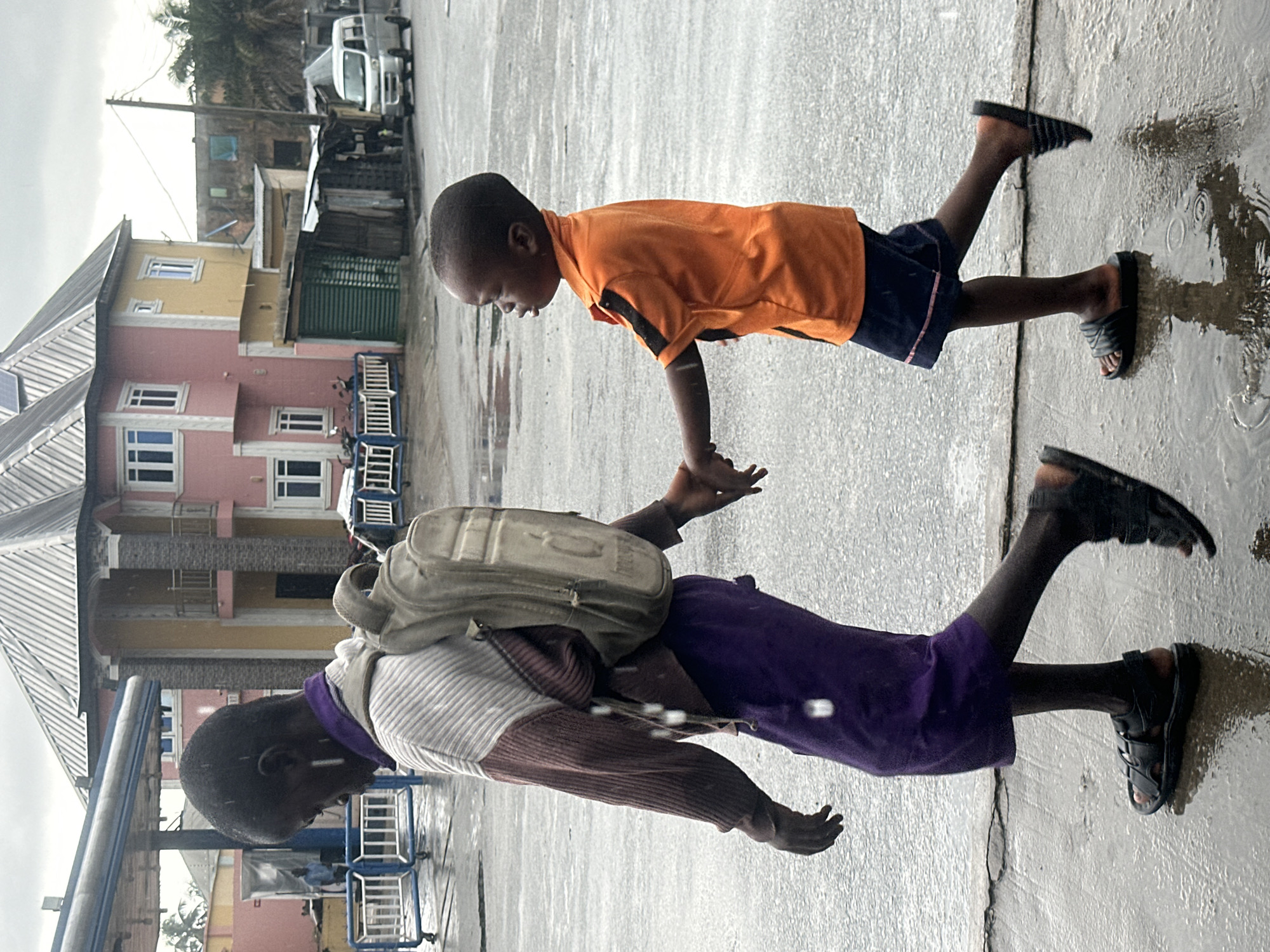 Rainy morning commute on foot and motorbike in Badagry