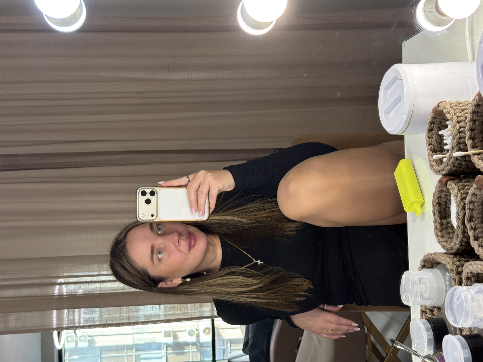 Person takes mirror selfie in Dolgoprudny, Russia
