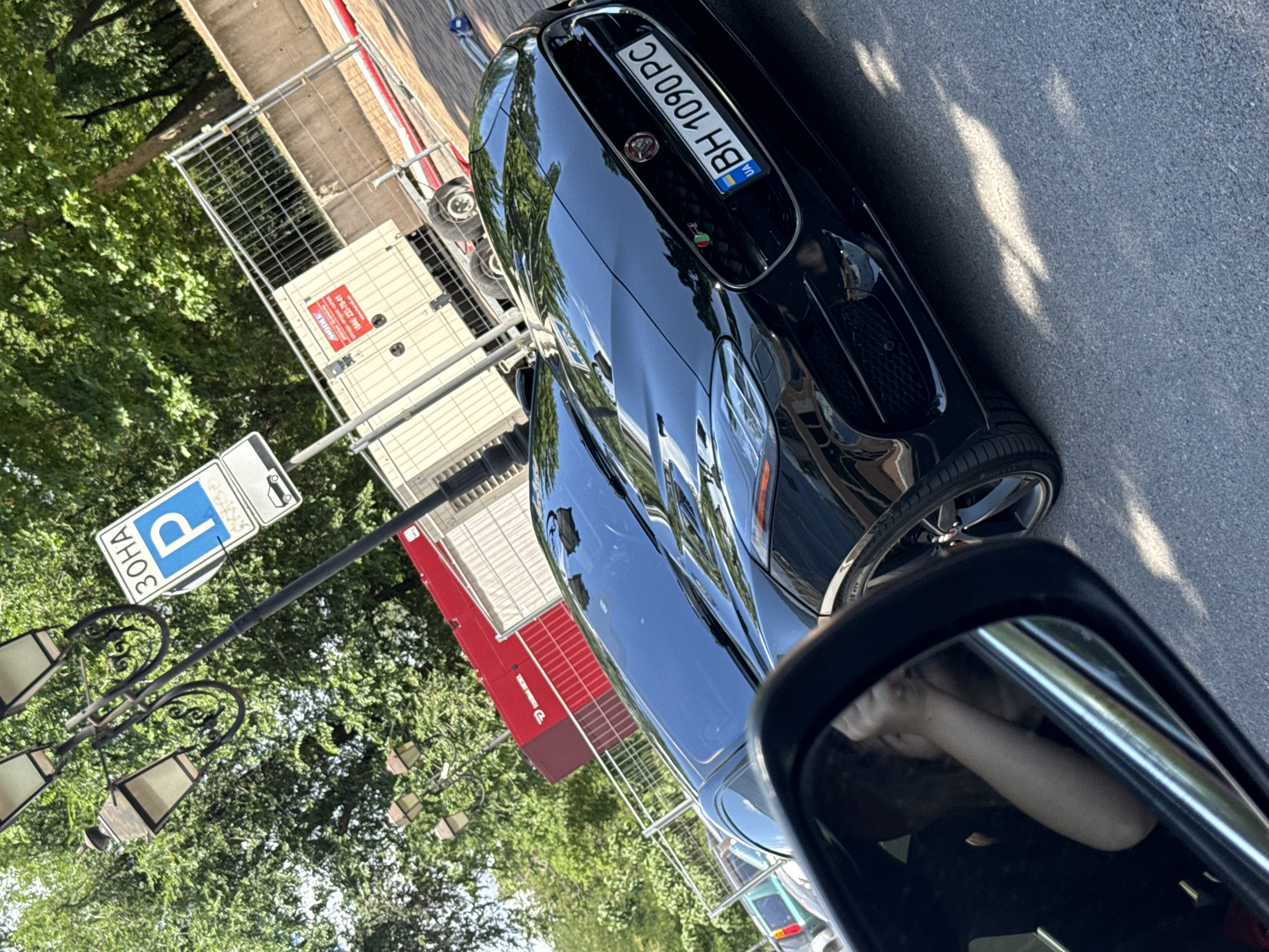 Street-level tour through Odesa's cars, landmarks, and commercial spaces