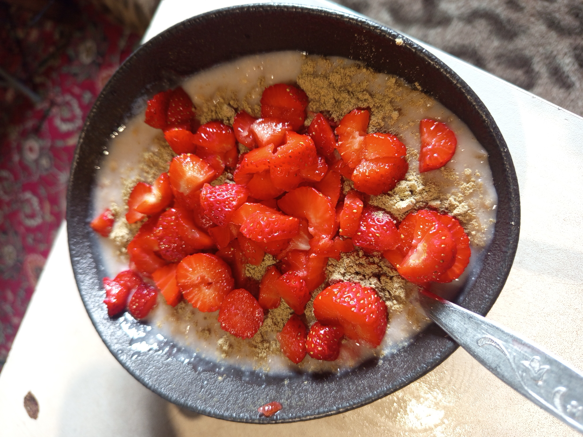 Oatmeal with strawberries, shot from above in Ostrovtsy
