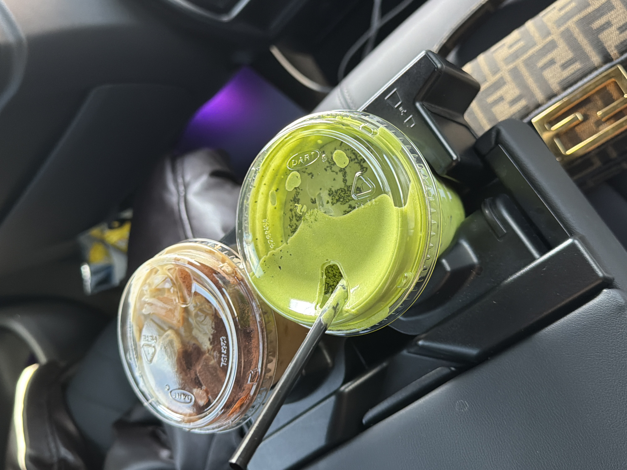 Two beverages spotted in car cup holder in Los Angeles