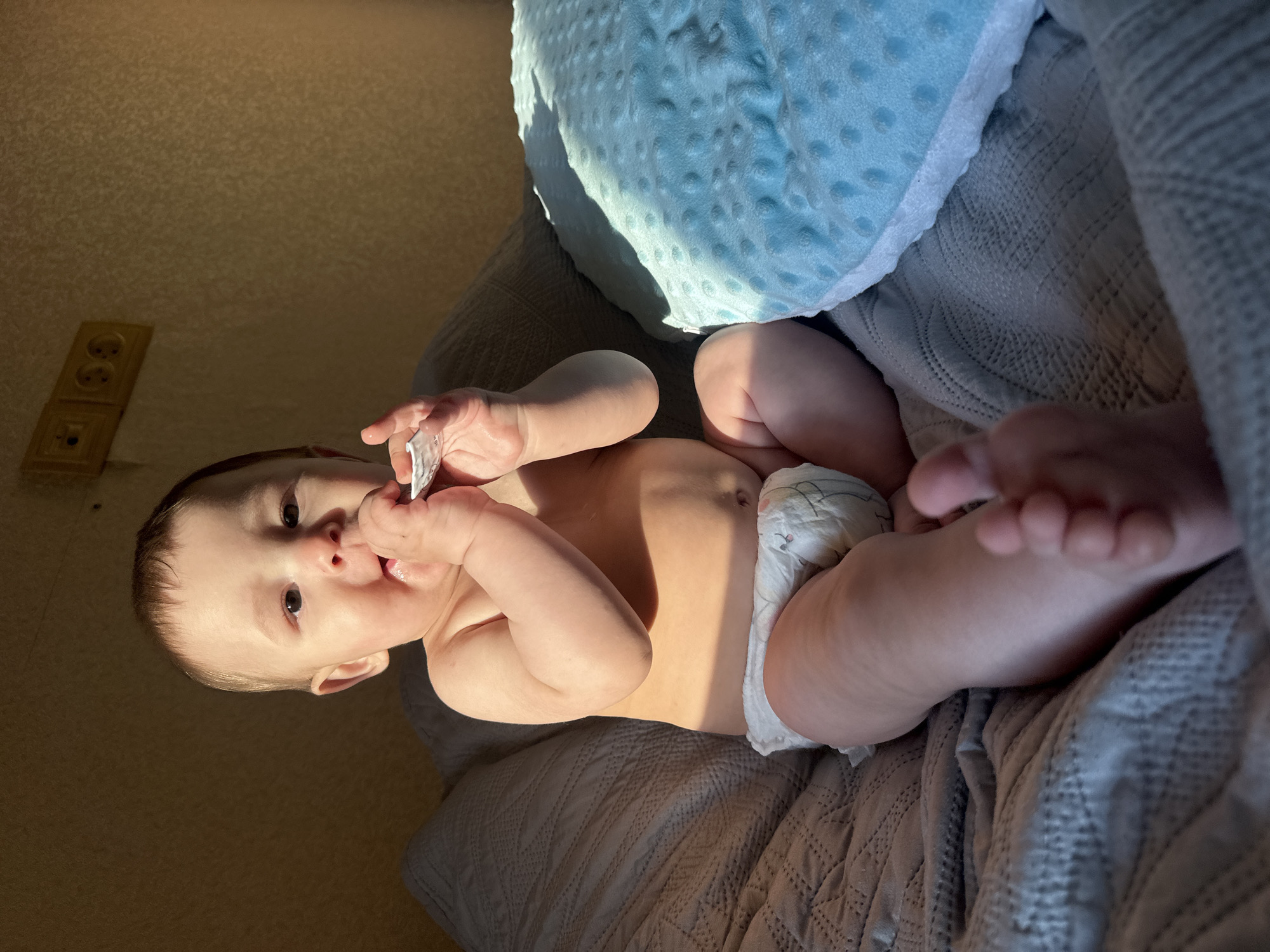 Mother and baby share tender moments during afternoon playtime