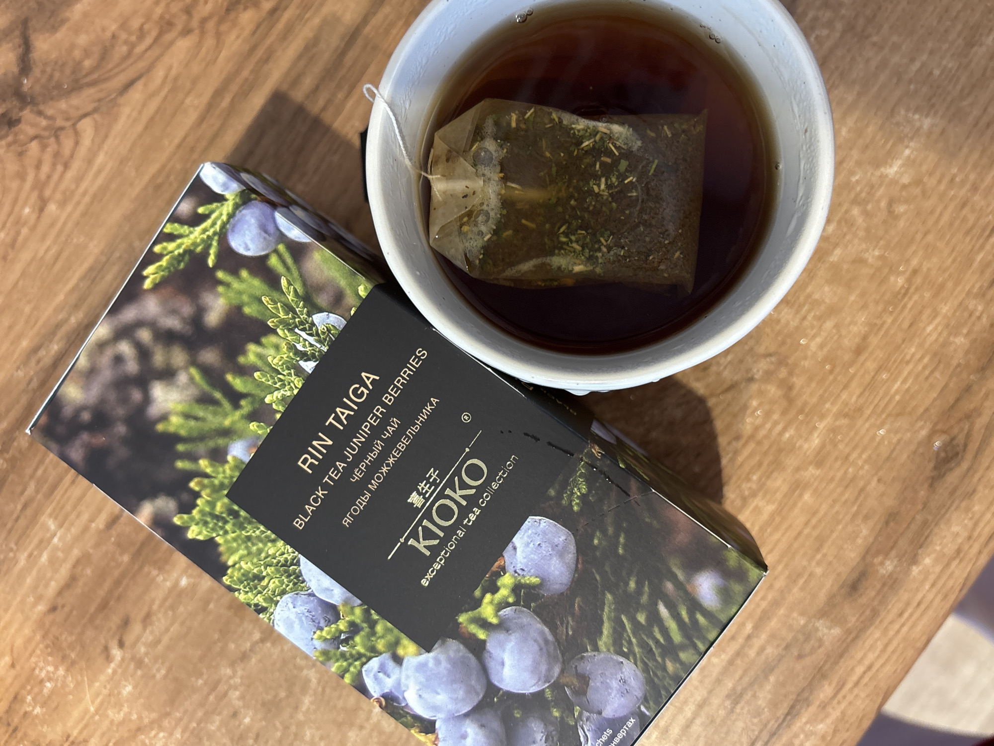 Juniper berry black tea, boxed and brewed