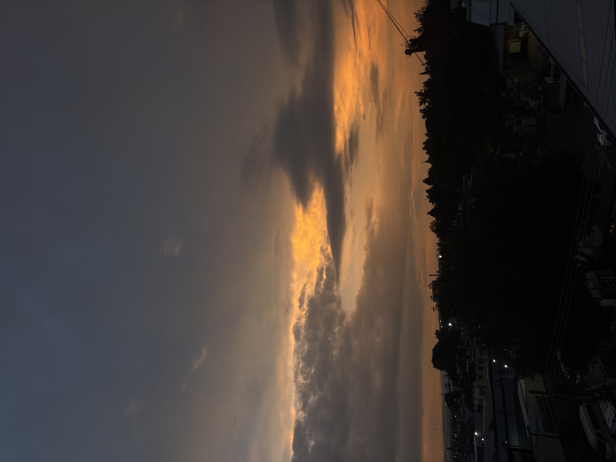 Evening clouds display golden glow over Puebla hotel district