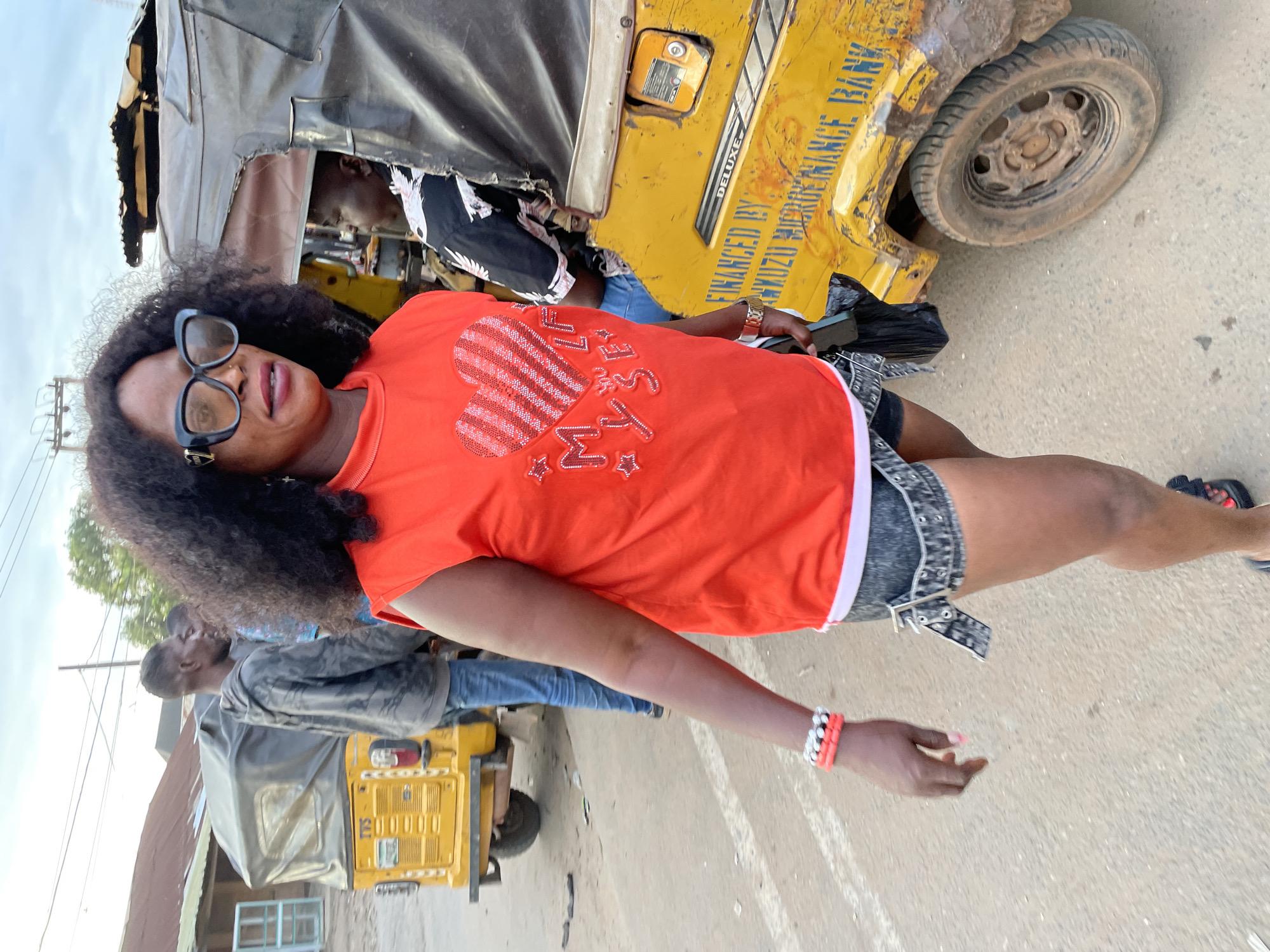 Everyday street life in Nkpor, Nigeria, late afternoon