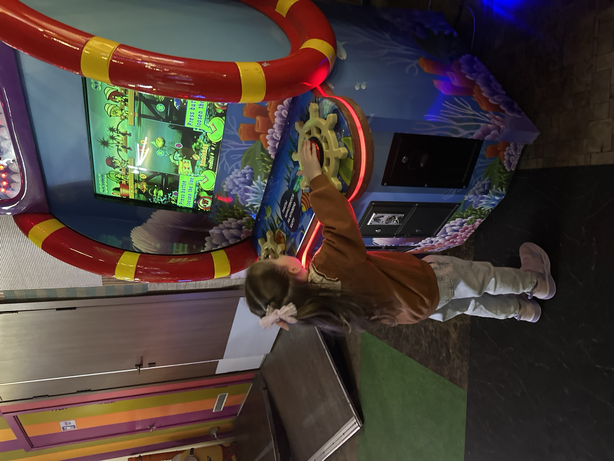 Family enjoys bowling and arcade games at Lyubertsy entertainment center