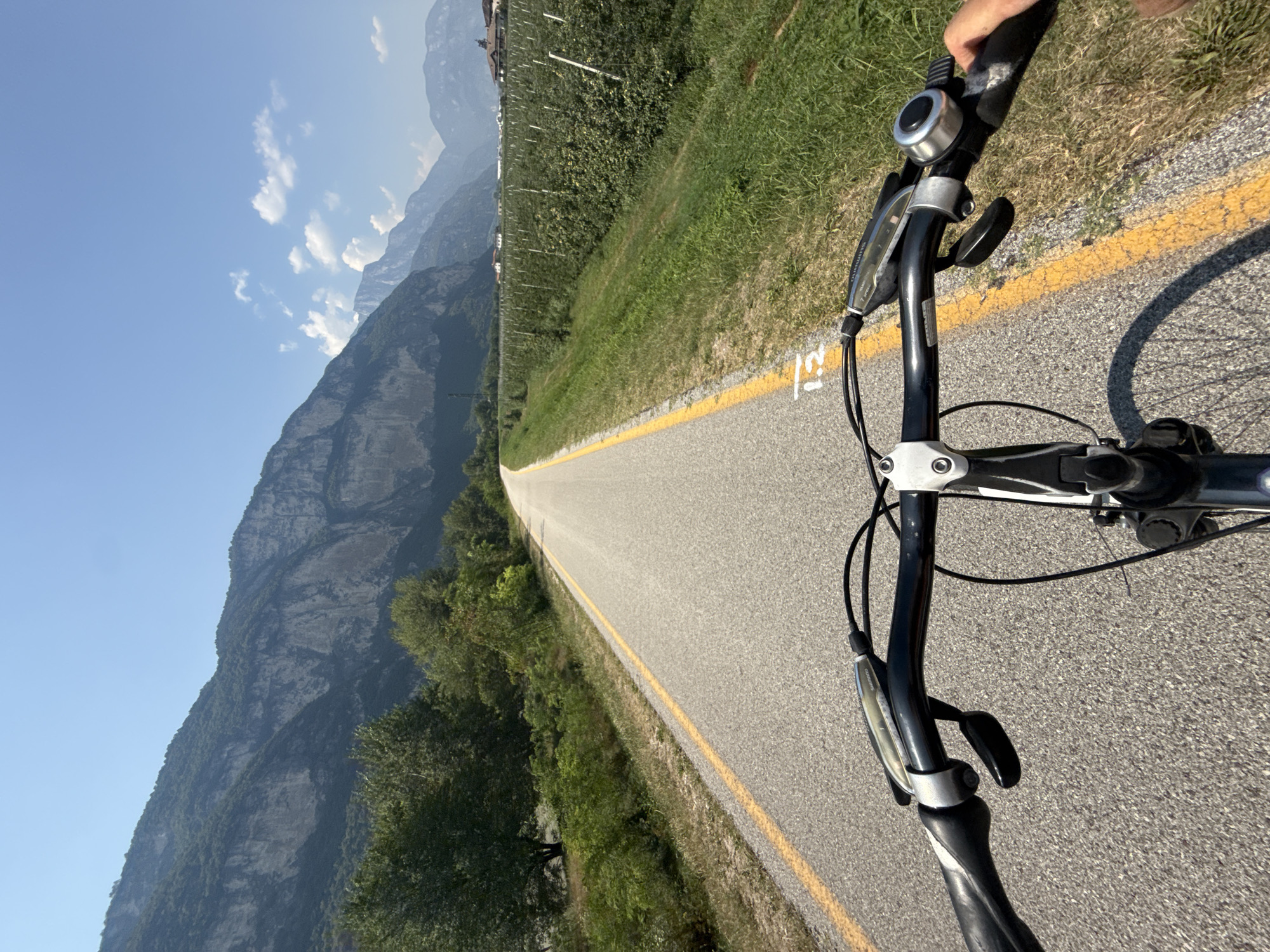 Cycling through Trento's orchard and vineyard countryside