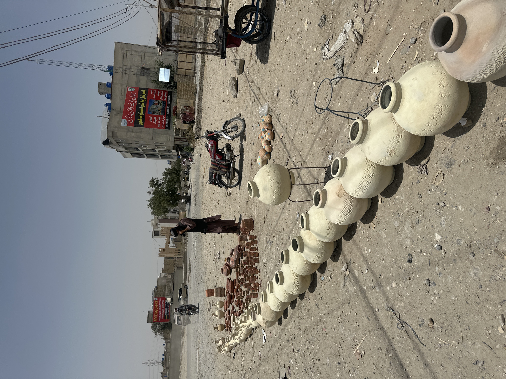 Roadside life in Quetta: clay pots for sale, rest under a tree