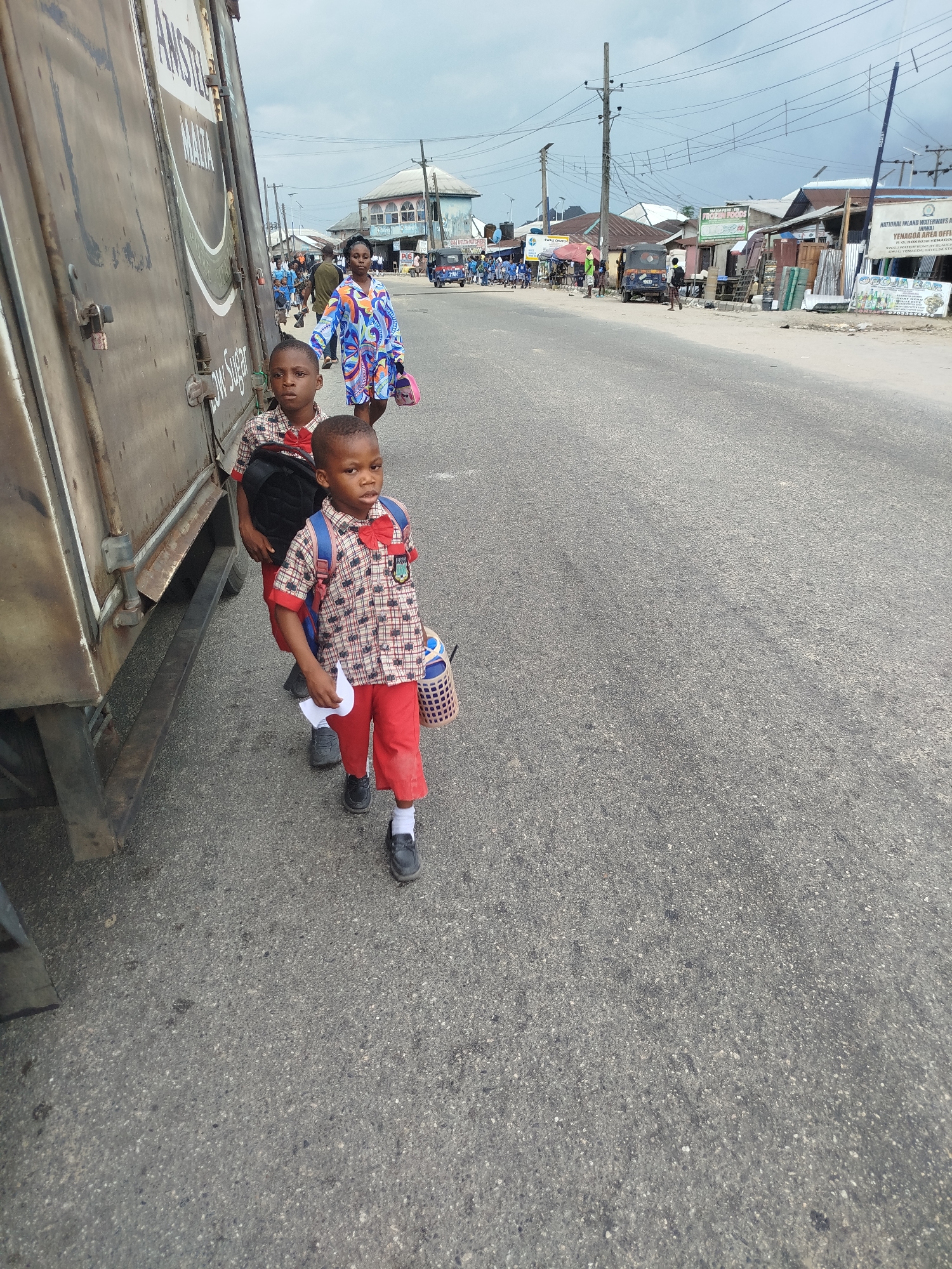 Students and street life on a Yenagoa afternoon