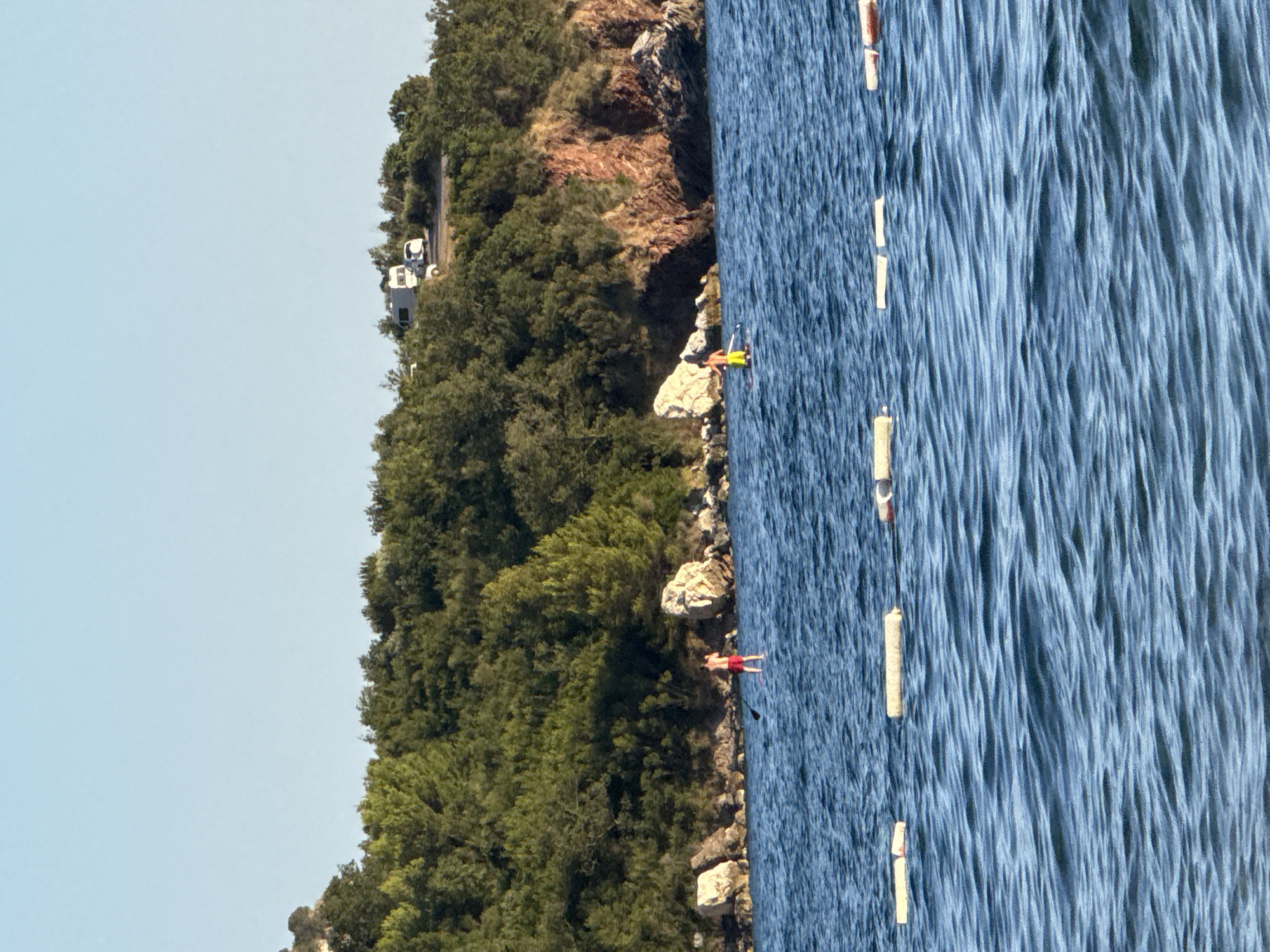 Calm waters and green hills along the Montenegrin coast