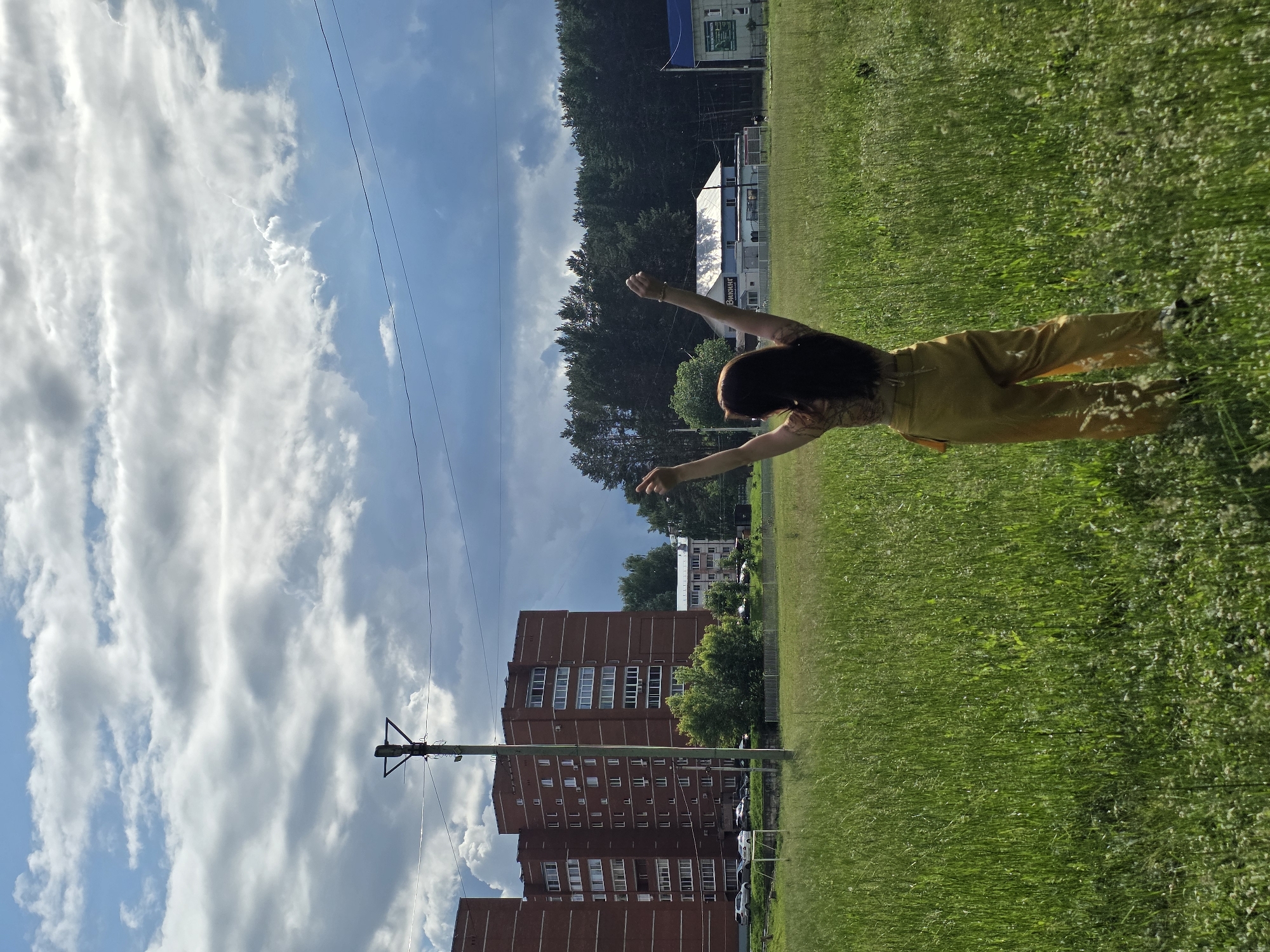 Woman documents park visit and fishing scene in Chaikovsky