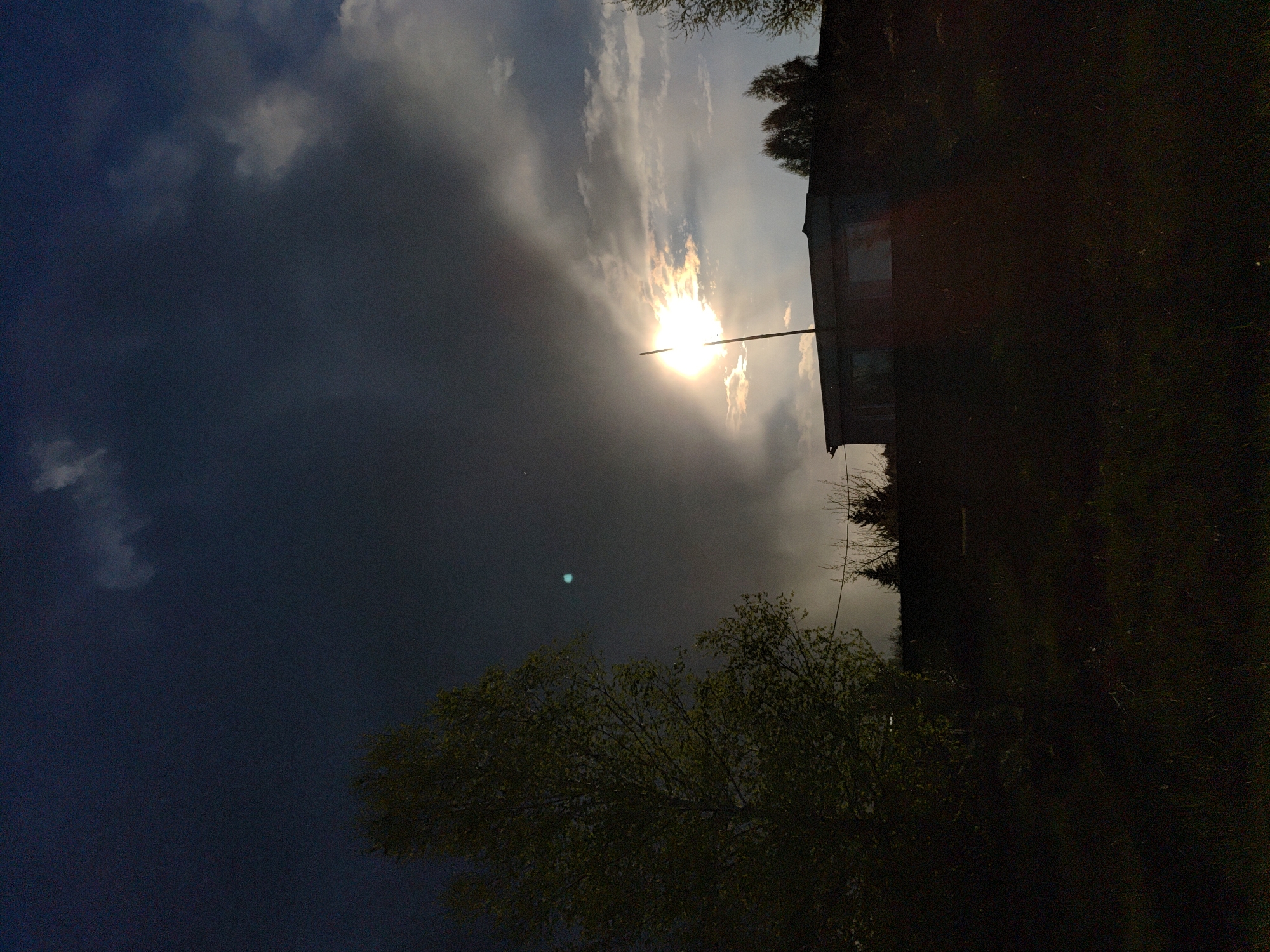 Dramatic sunbeams captured through clouds at Markovo, Russia