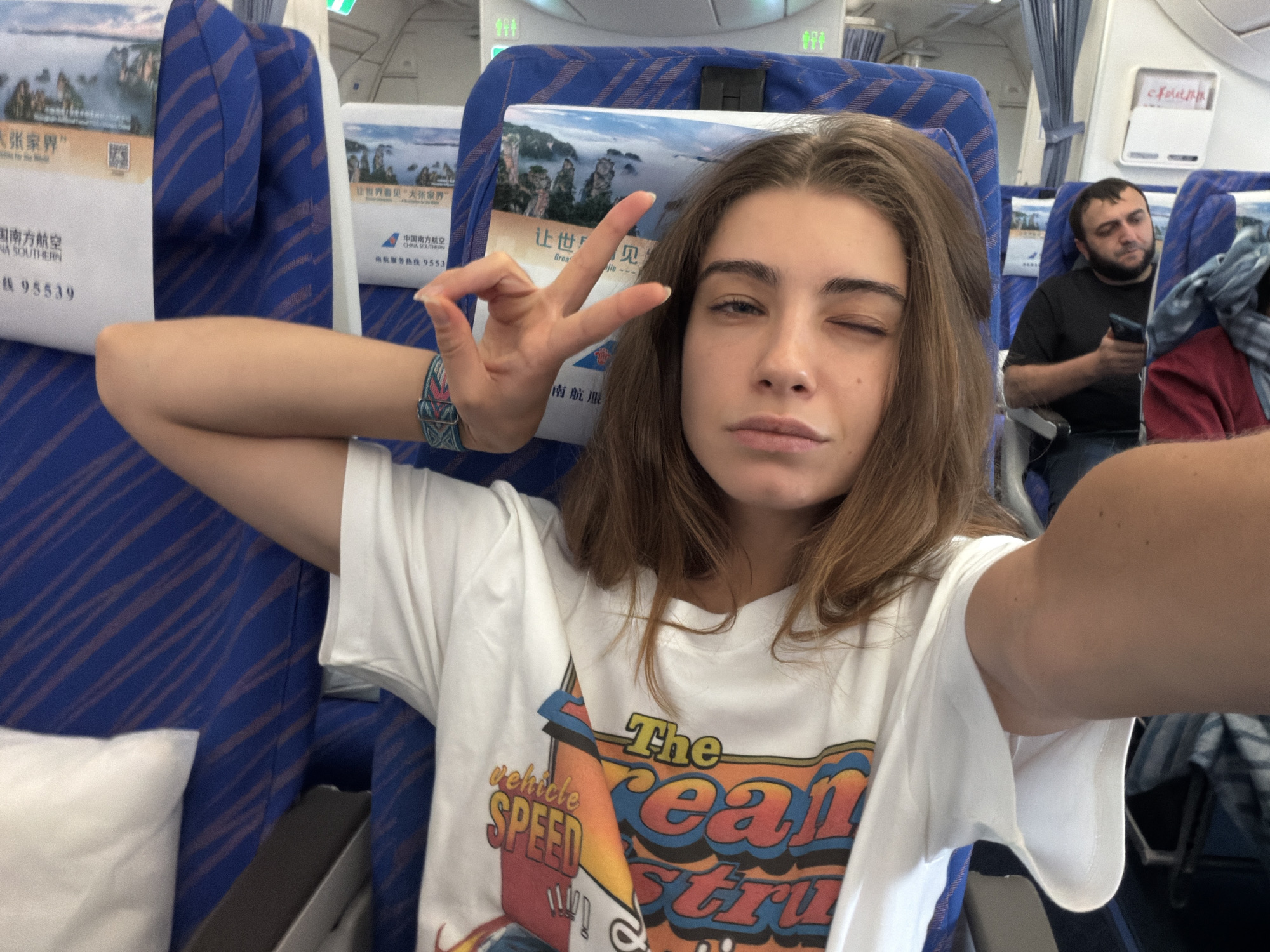 Passenger takes selfie on airplane in Baiyun District