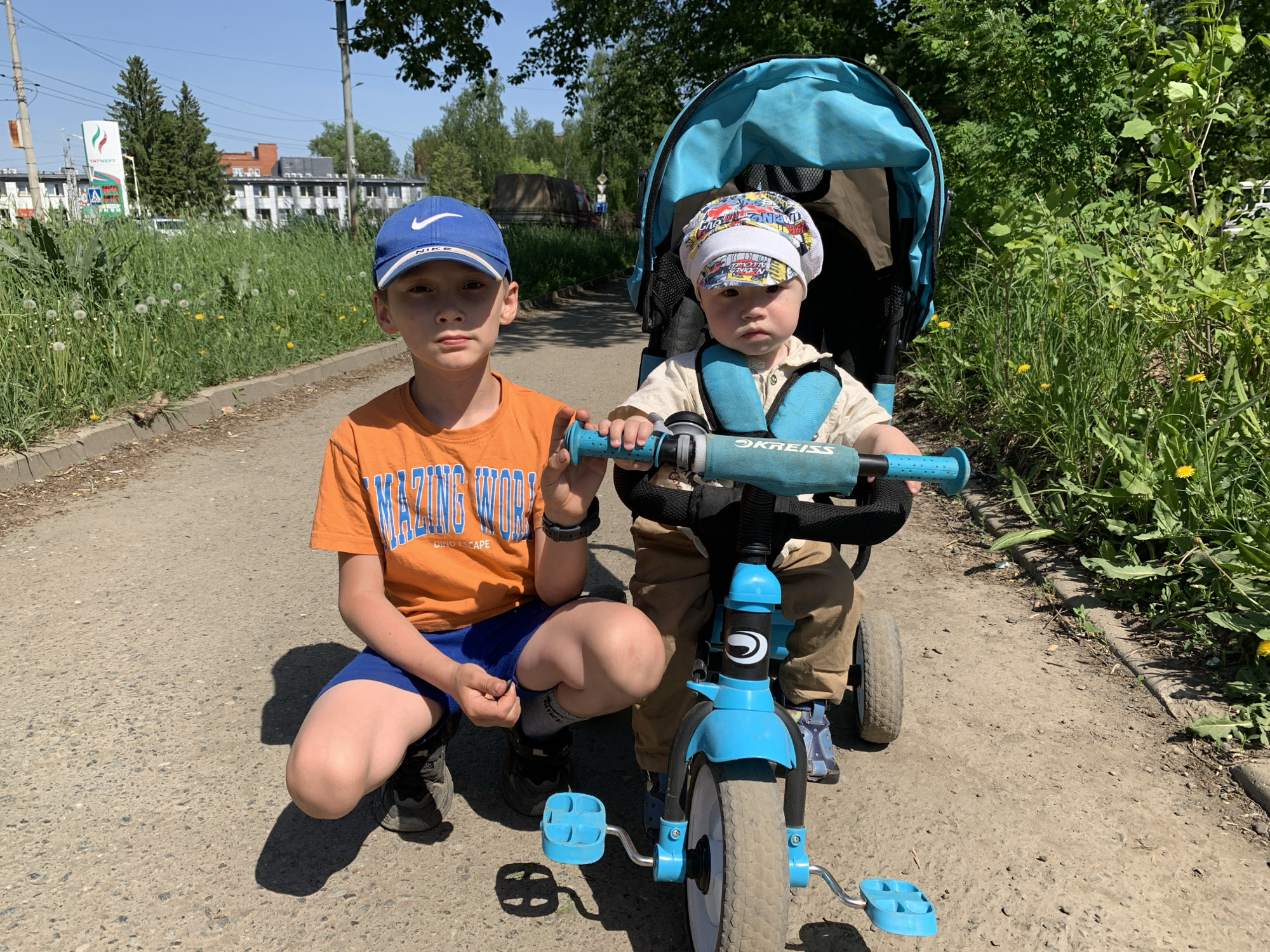 Children play on path in Izhevsk during morning hours
