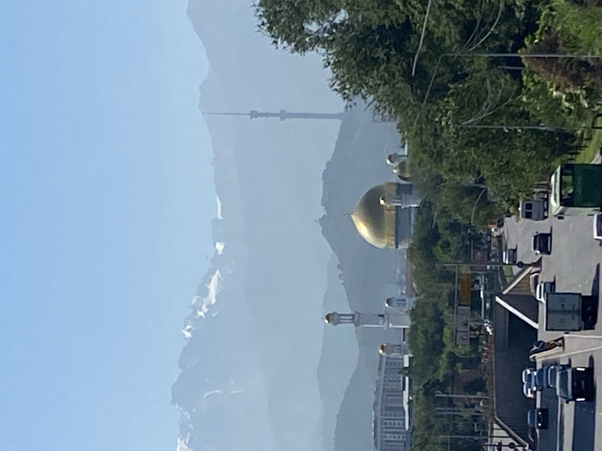 Almaty skyline with Tien Shan peaks and Central State Mosque
