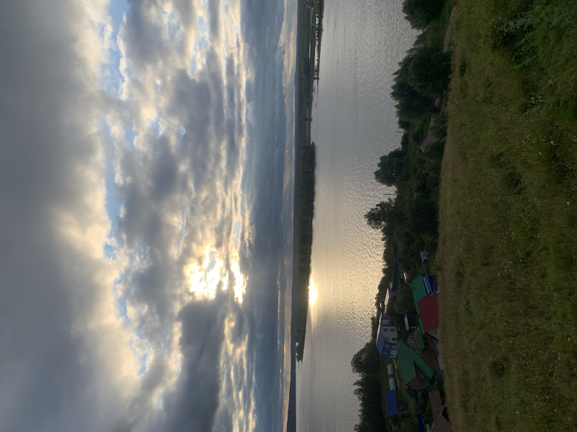Hilltop picnic overlooking a wide river in rural Russia
