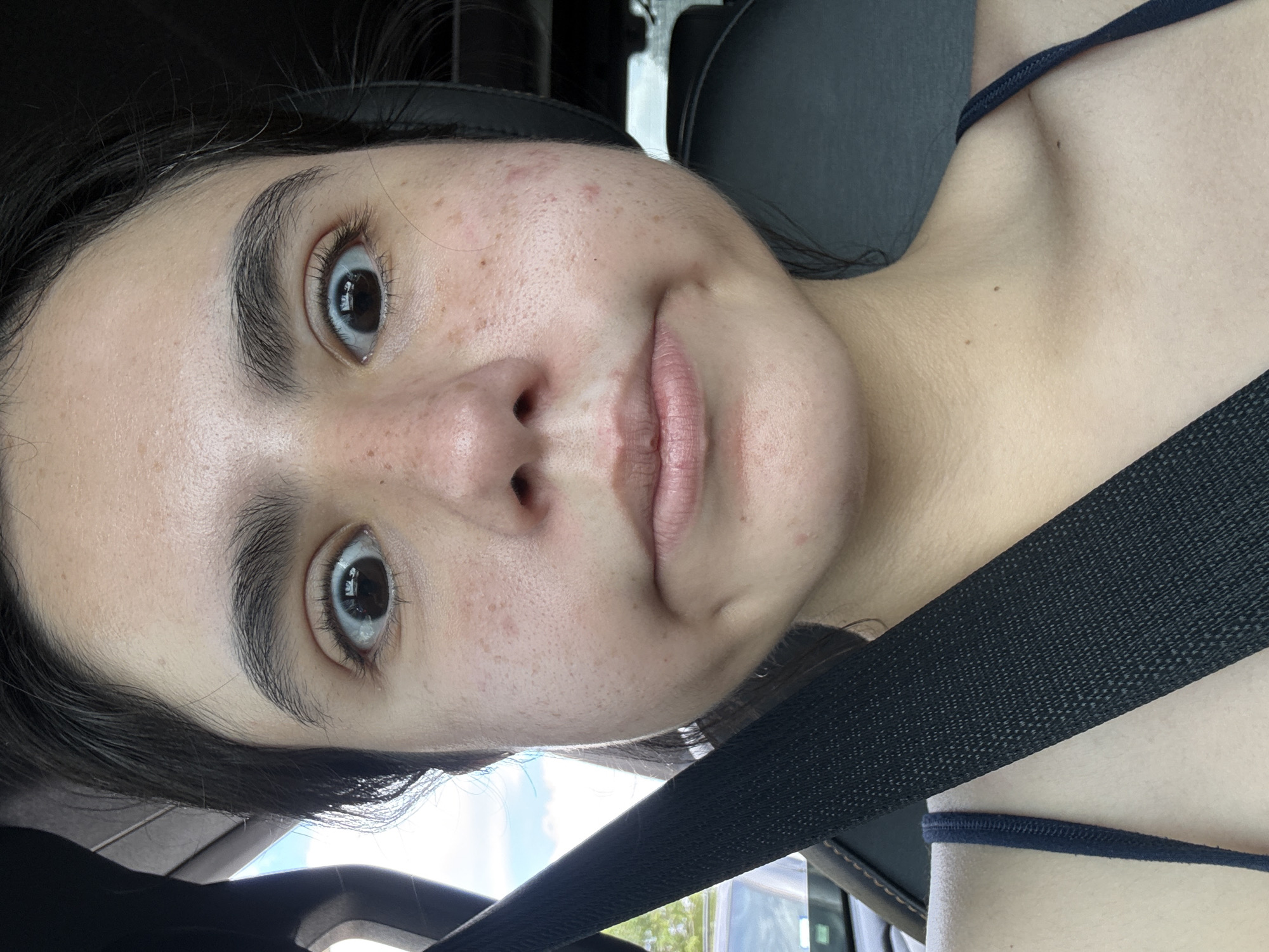 Young woman photographed driving near South Congress Avenue, Austin