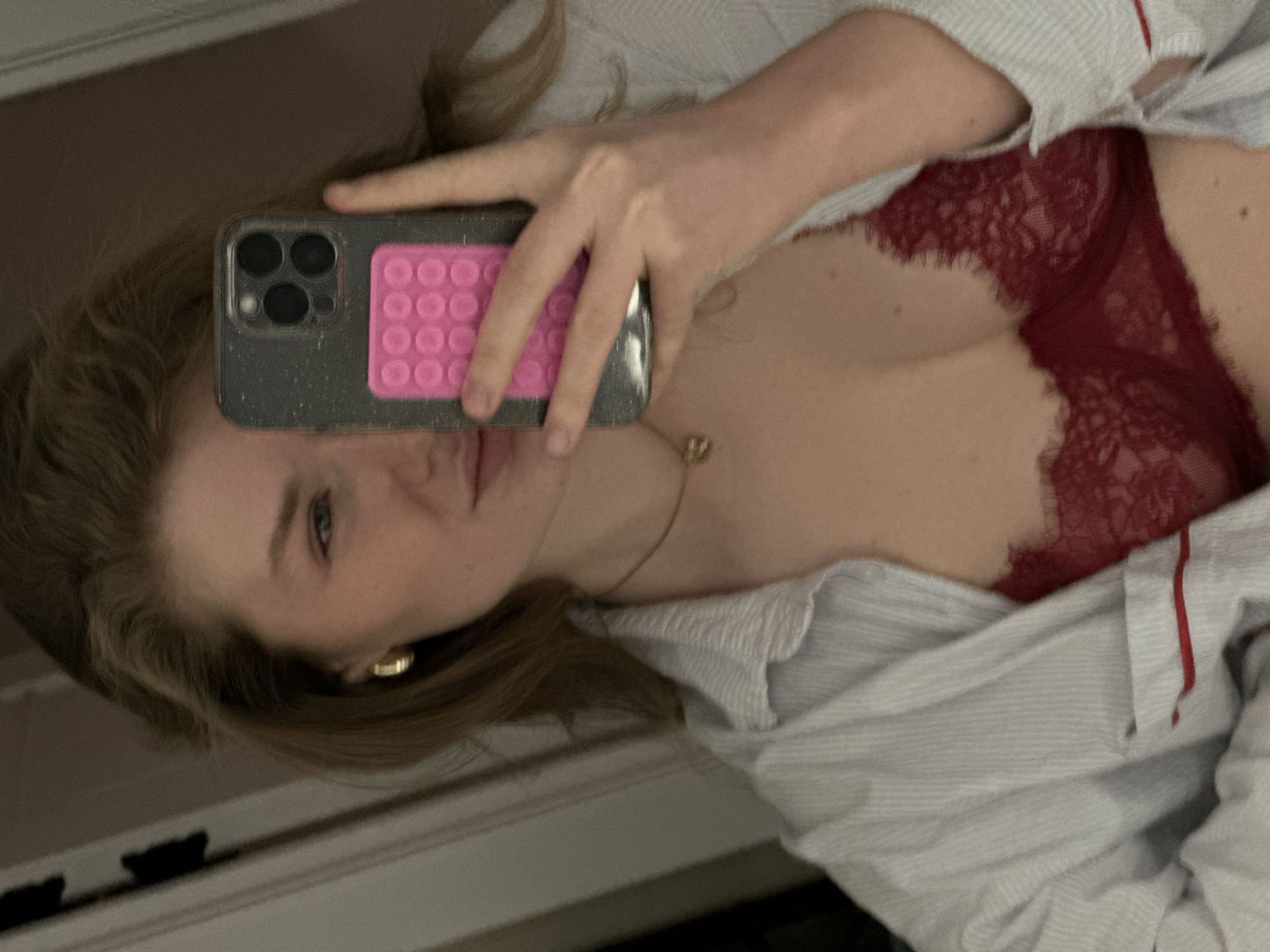 Woman takes indoor selfies in Kazan apartment