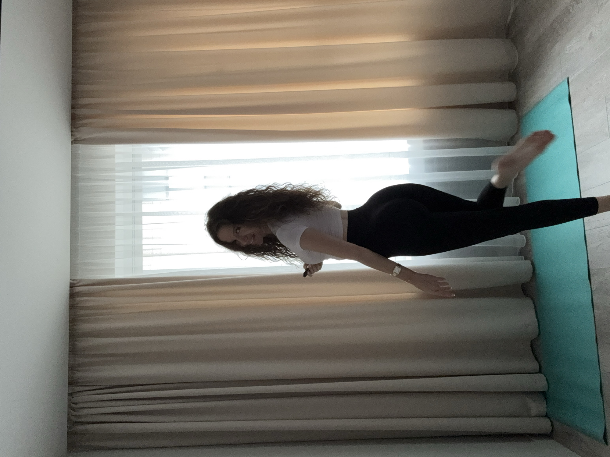 Indoor yoga practice with headstands in Moscow apartment