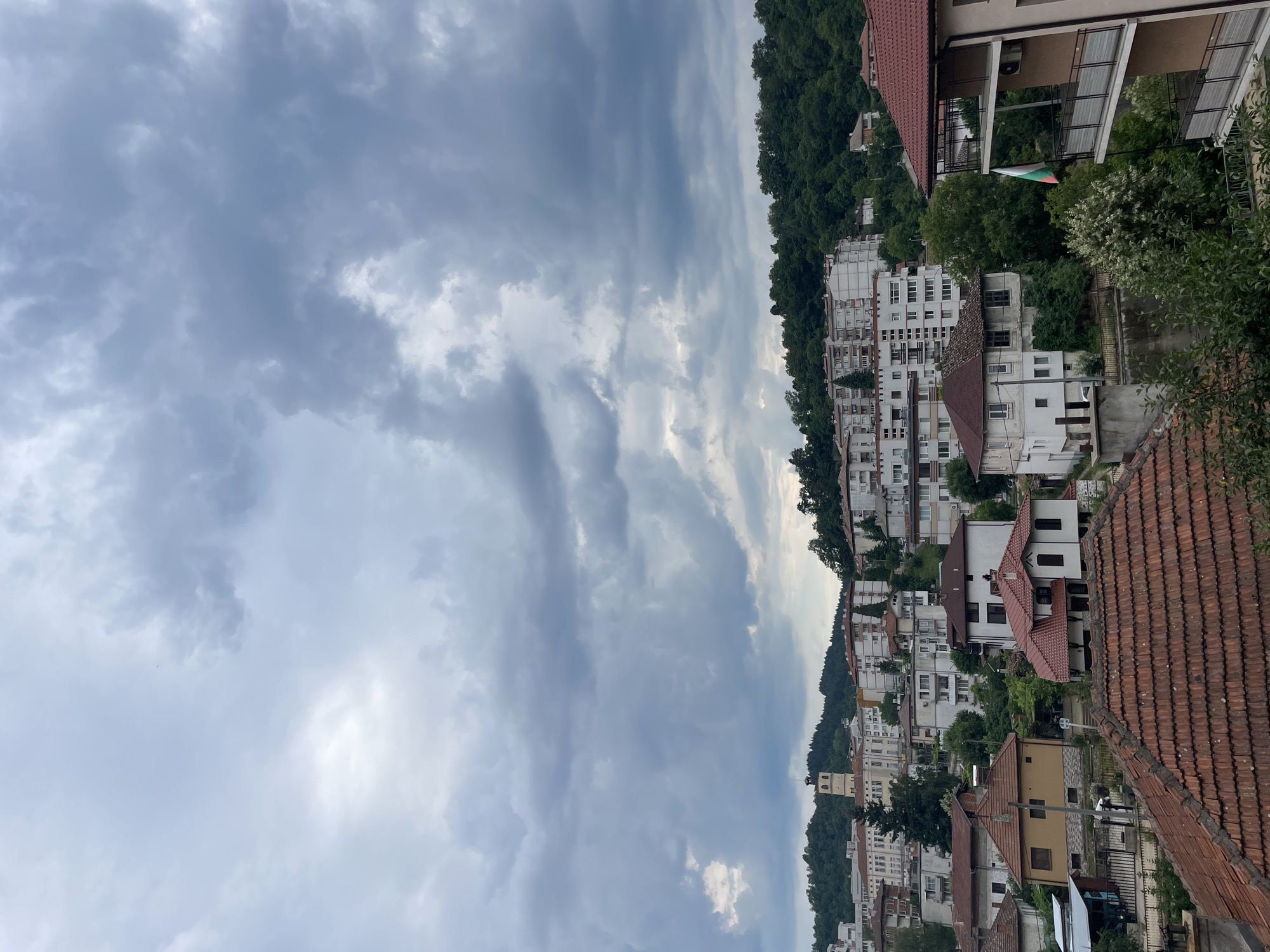 Zlatograd hillside town under brooding summer skies