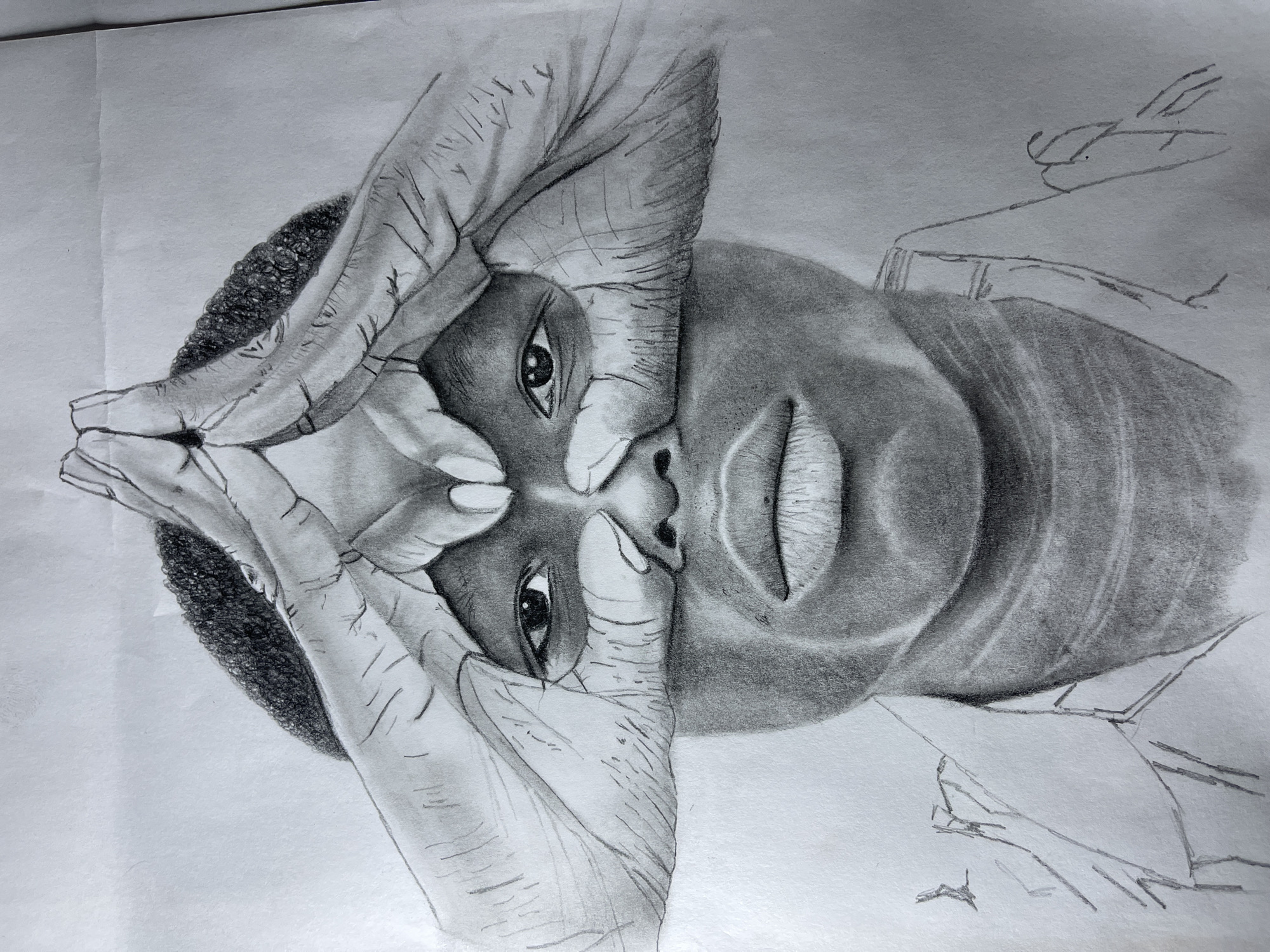 Artist creates detailed pencil portrait in Jos, Nigeria