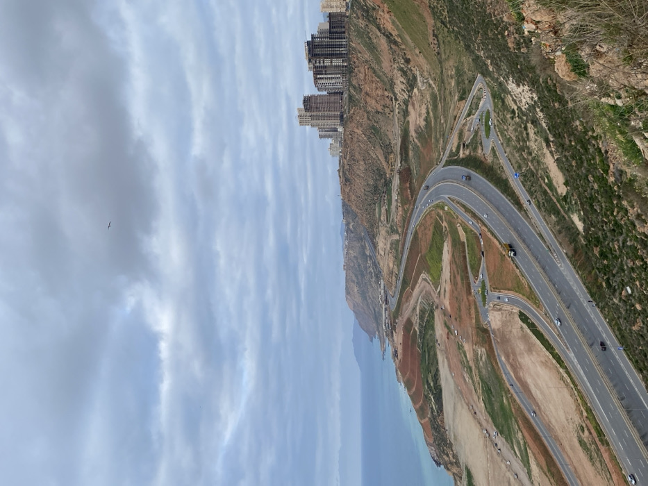 Overcast coastal panorama captured along Oran's Mediterranean highway