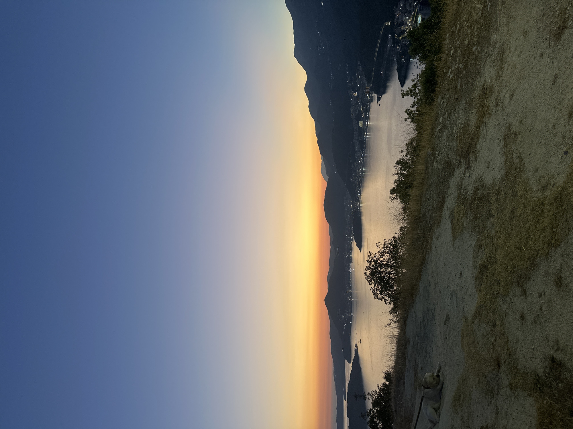 Twilight panorama over Sveti Stefan's mountain-meet-sea coastline