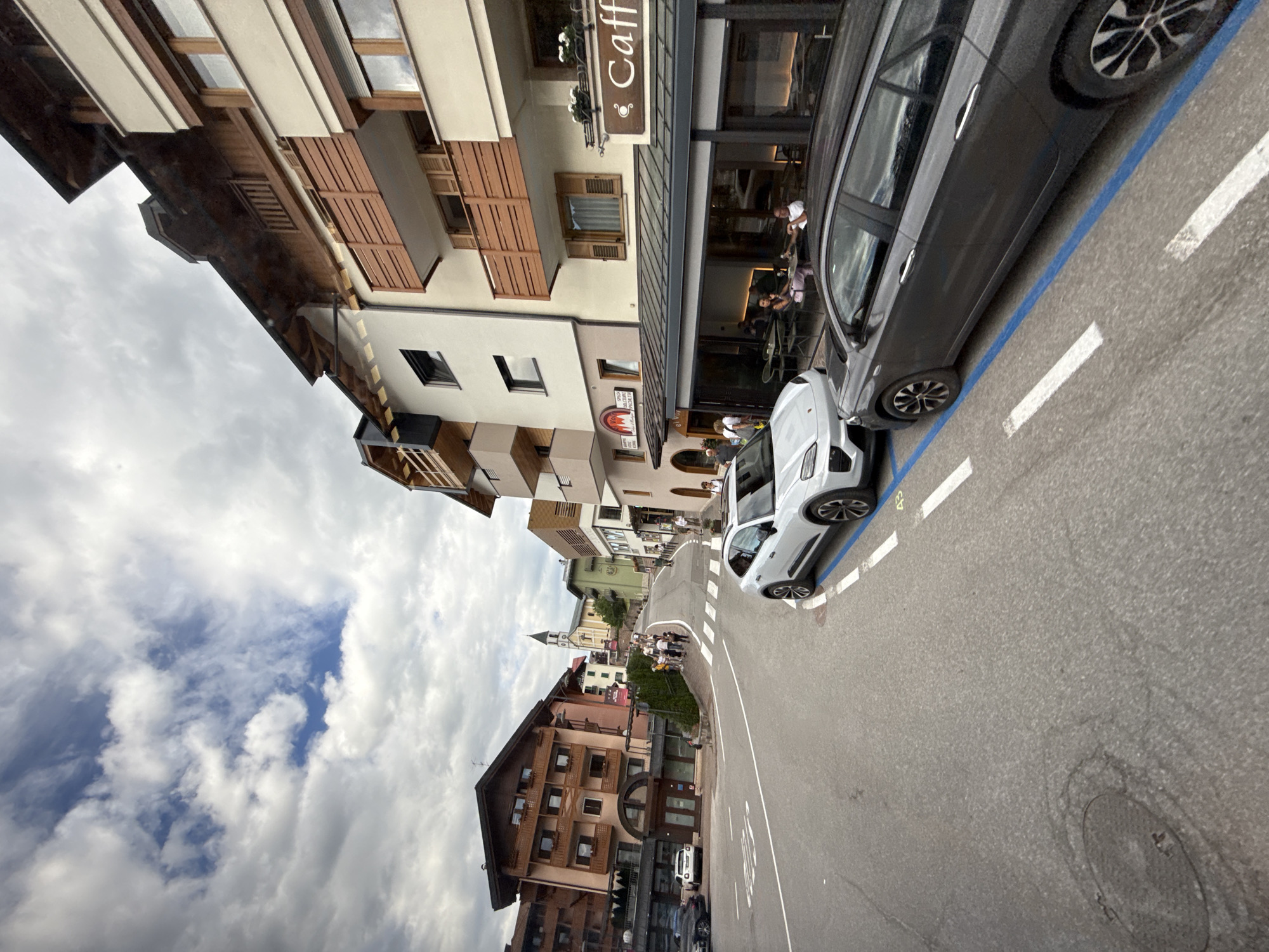 Quiet street corner in Andalo, Italy, on a cloudy afternoon