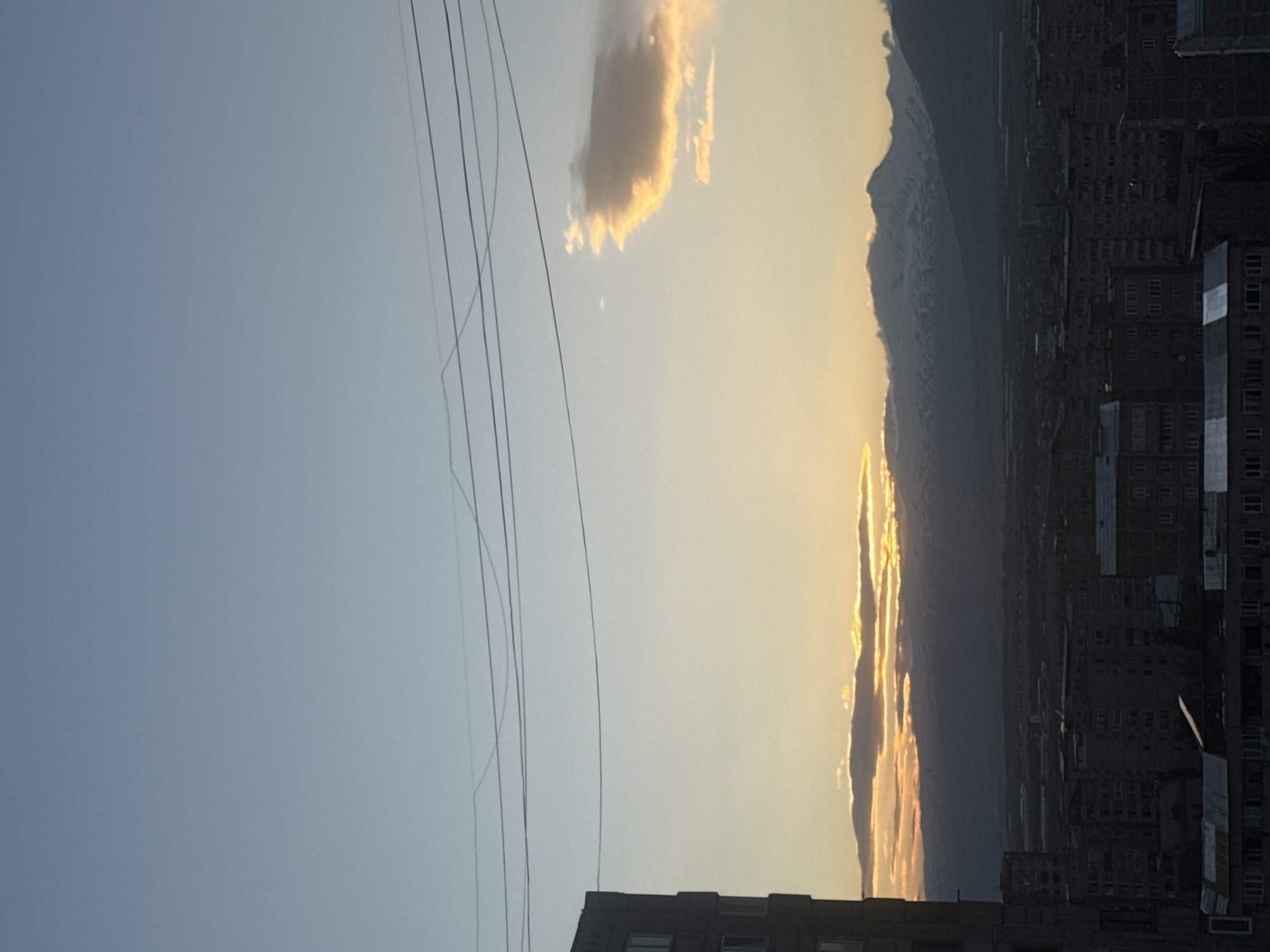 Sunset clouds illuminate Abovyan Armenia cityscape May 29