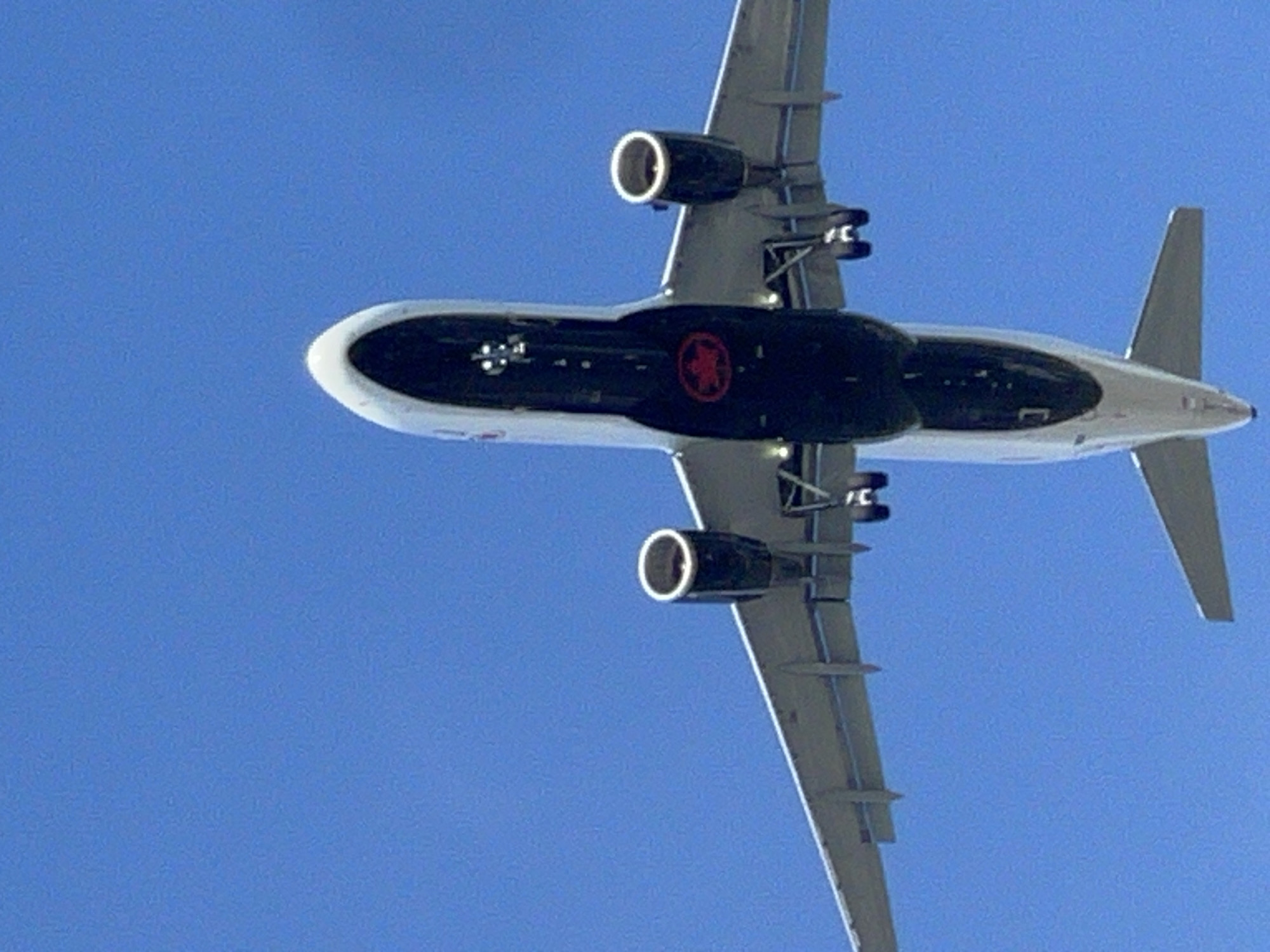 Planes climbing out of YVR while a wheel swap happens below
