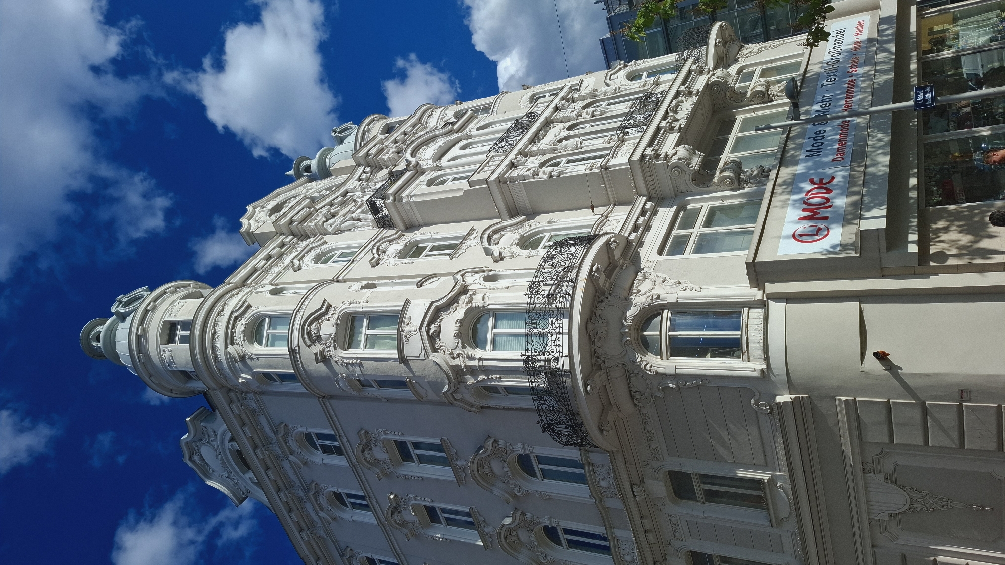Ornate building facade photographed in Vienna under blue skies