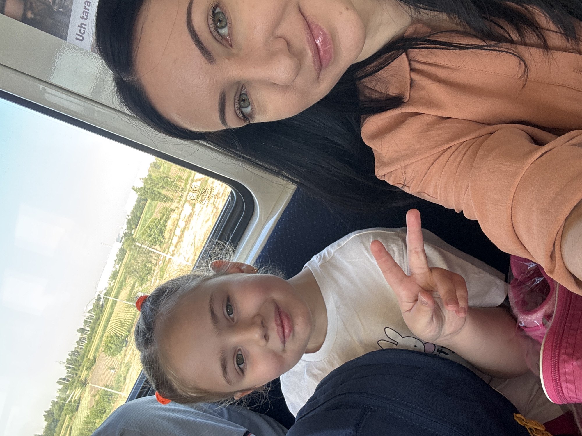 On a moving train through Tashkent, inside and out