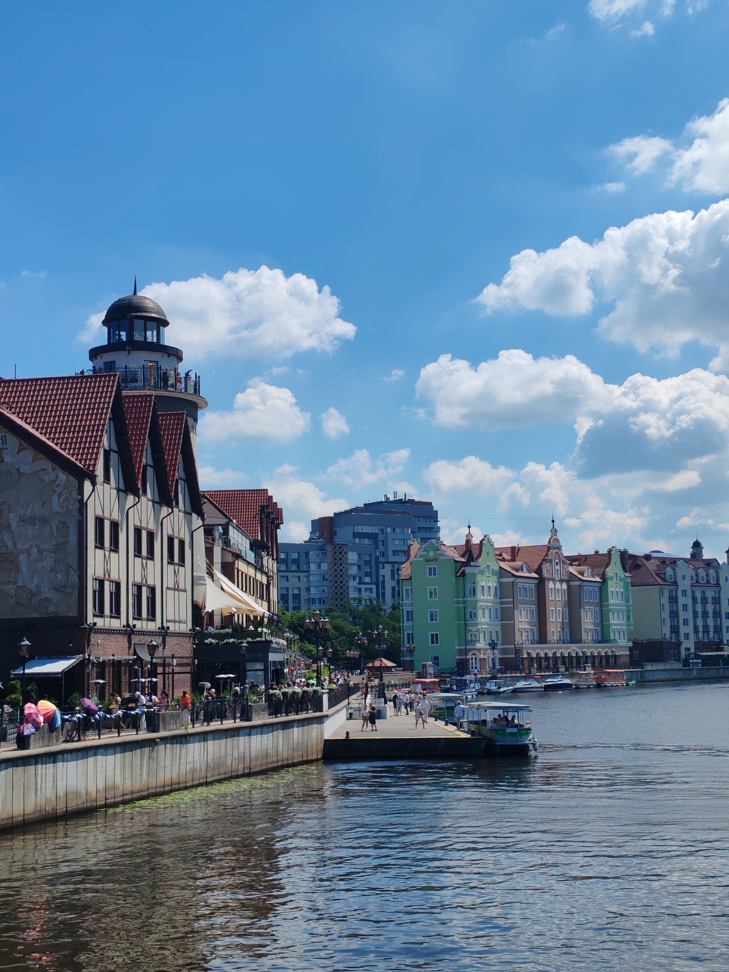 Sunny morning along Kaliningrad's waterfront cafes and promenade
