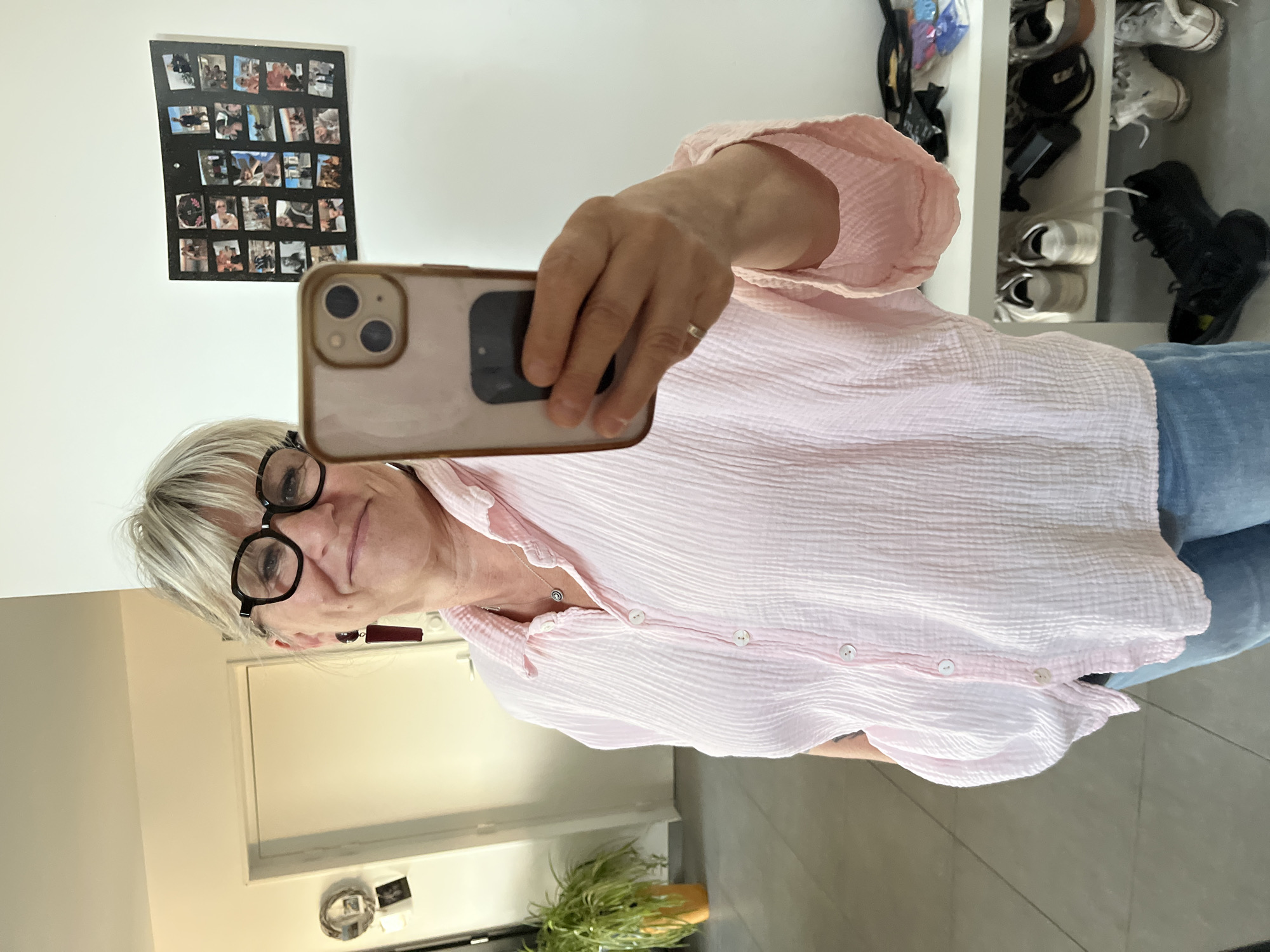 Woman takes mirror selfie in Chambœuf, France early morning
