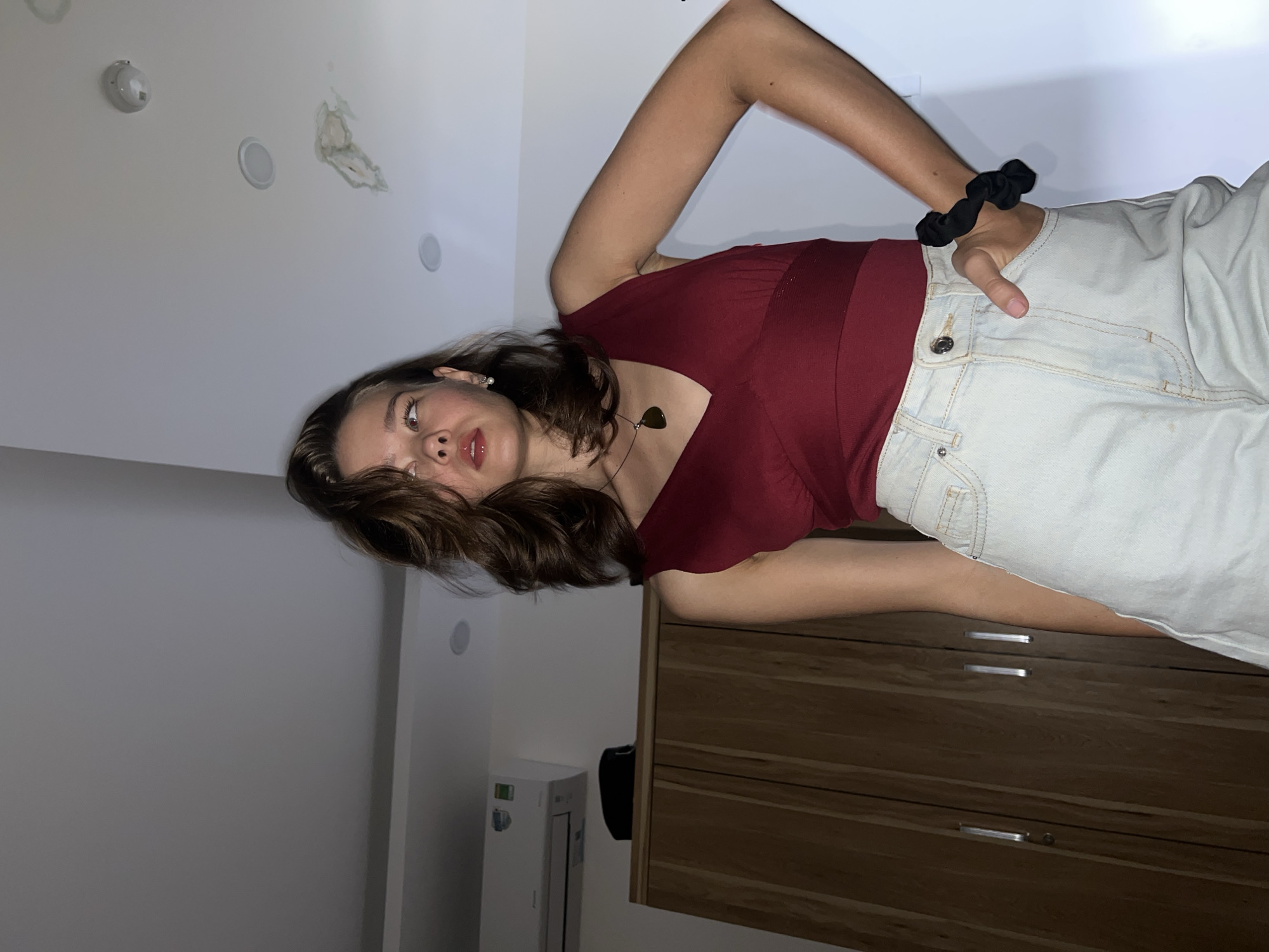 Woman poses indoors in Nha Trang apartment setting