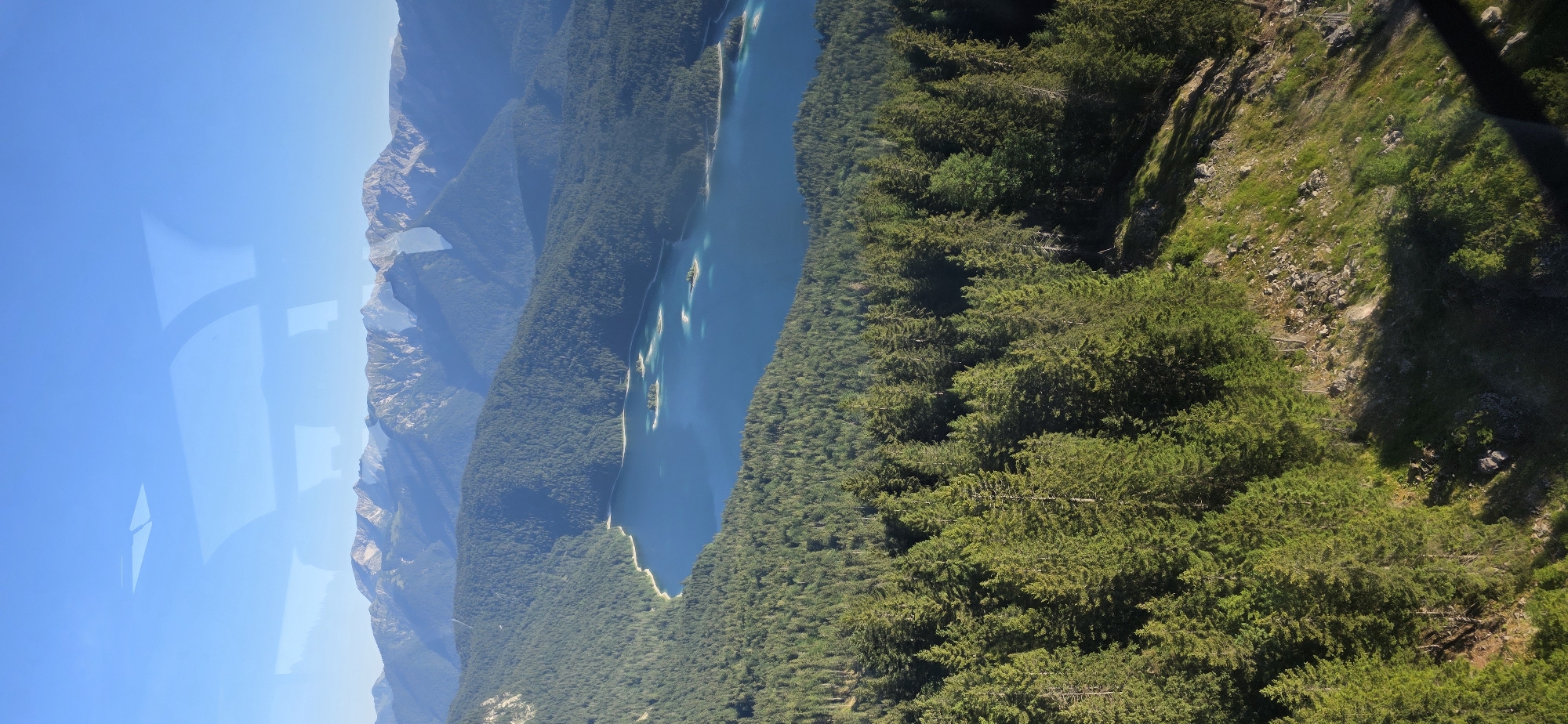 Eibsee lake from ground and air on a clear Alpine morning