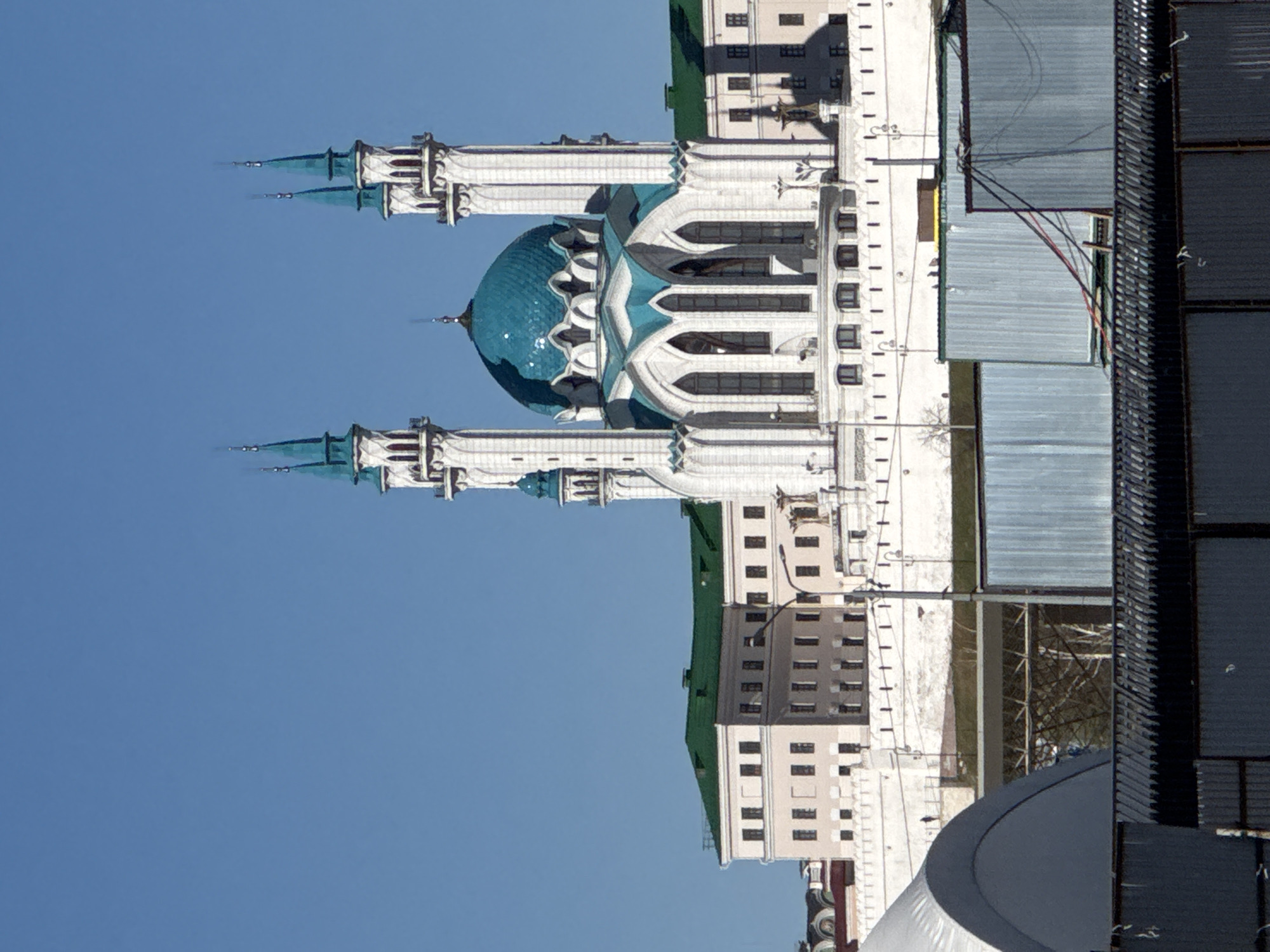 Man documents construction site visit near Kazan's historic mosque