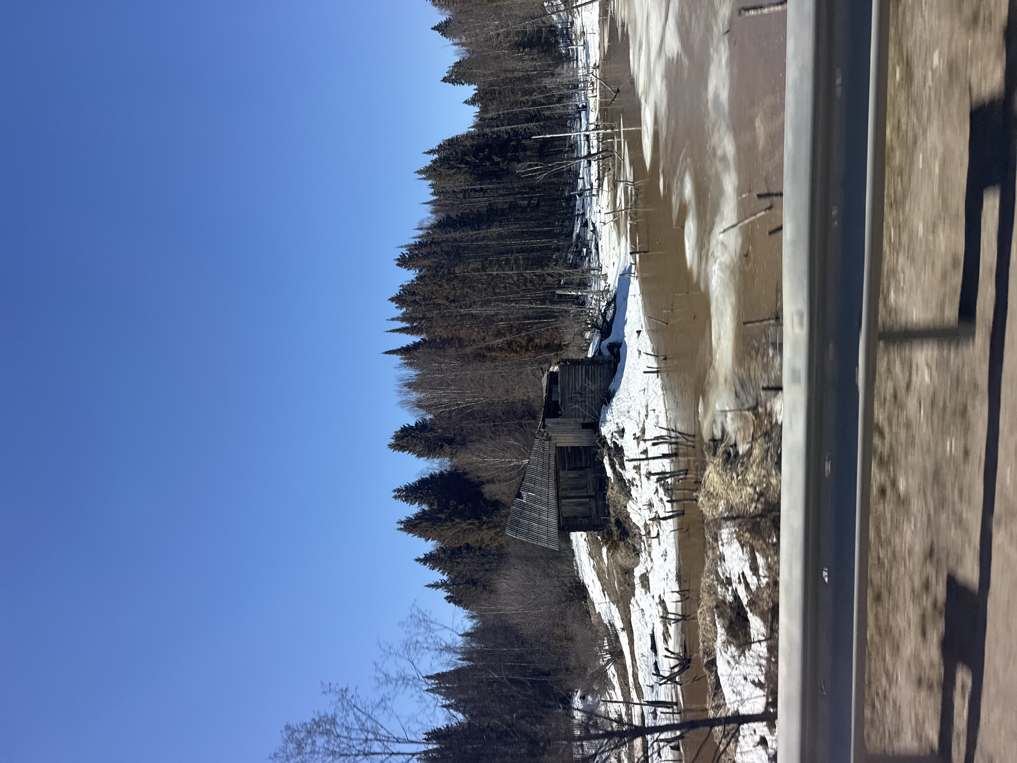 Wooden structure spotted in snowy Russian forest near Okulov