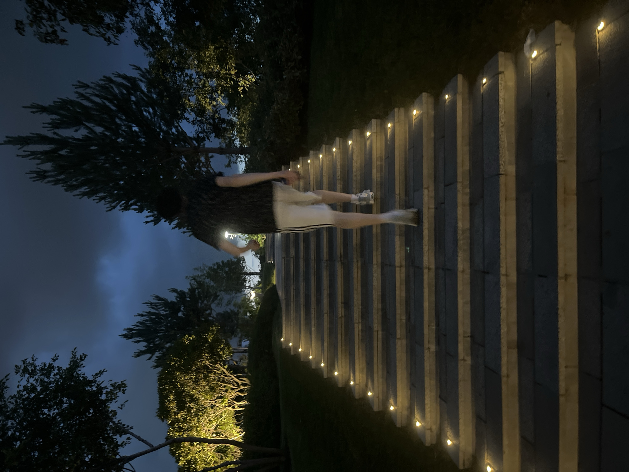 Evening stroll captured at illuminated Krasnodar park fountain display