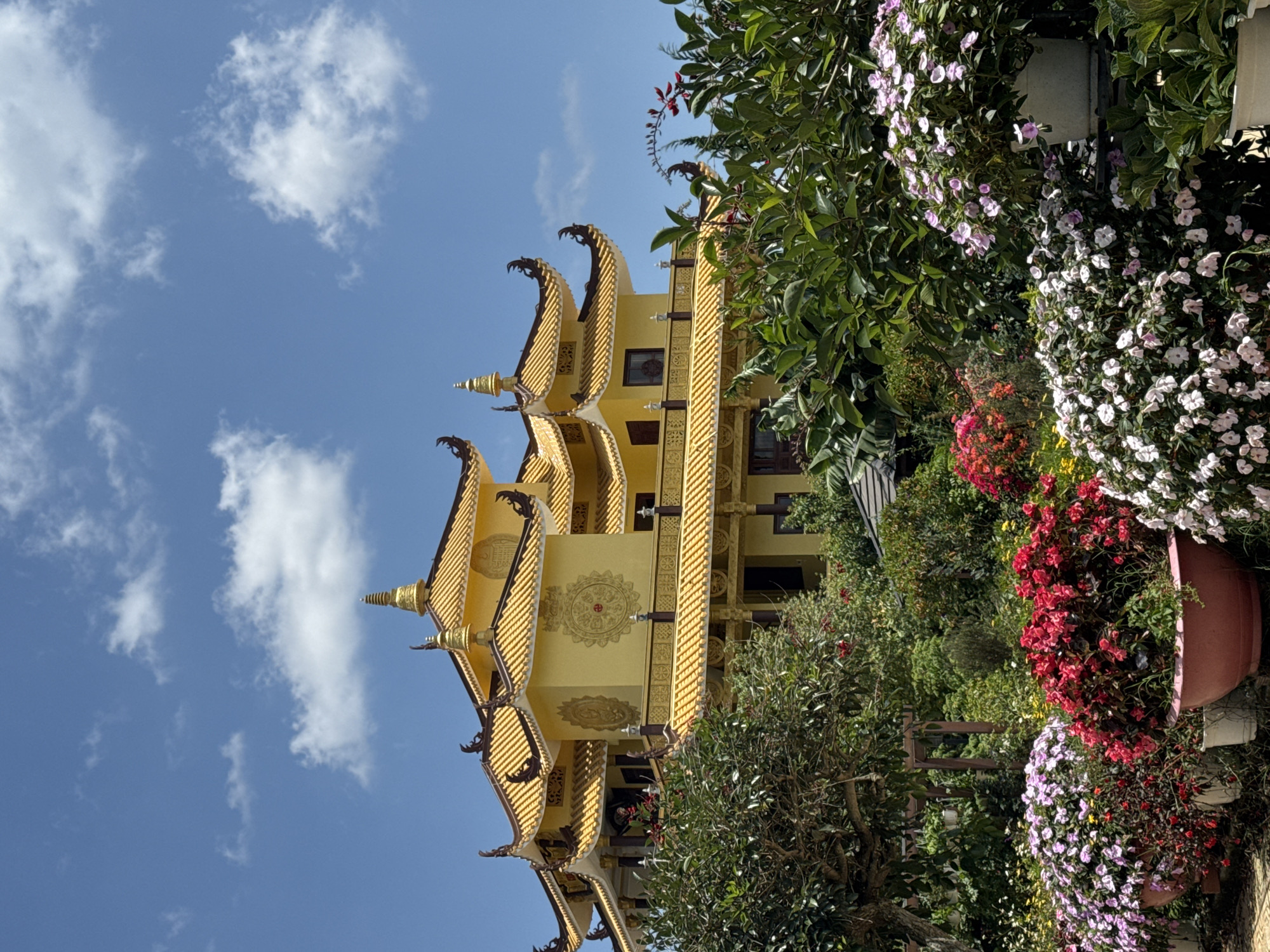 Da Lat's golden pagoda and flower market, mid-morning.