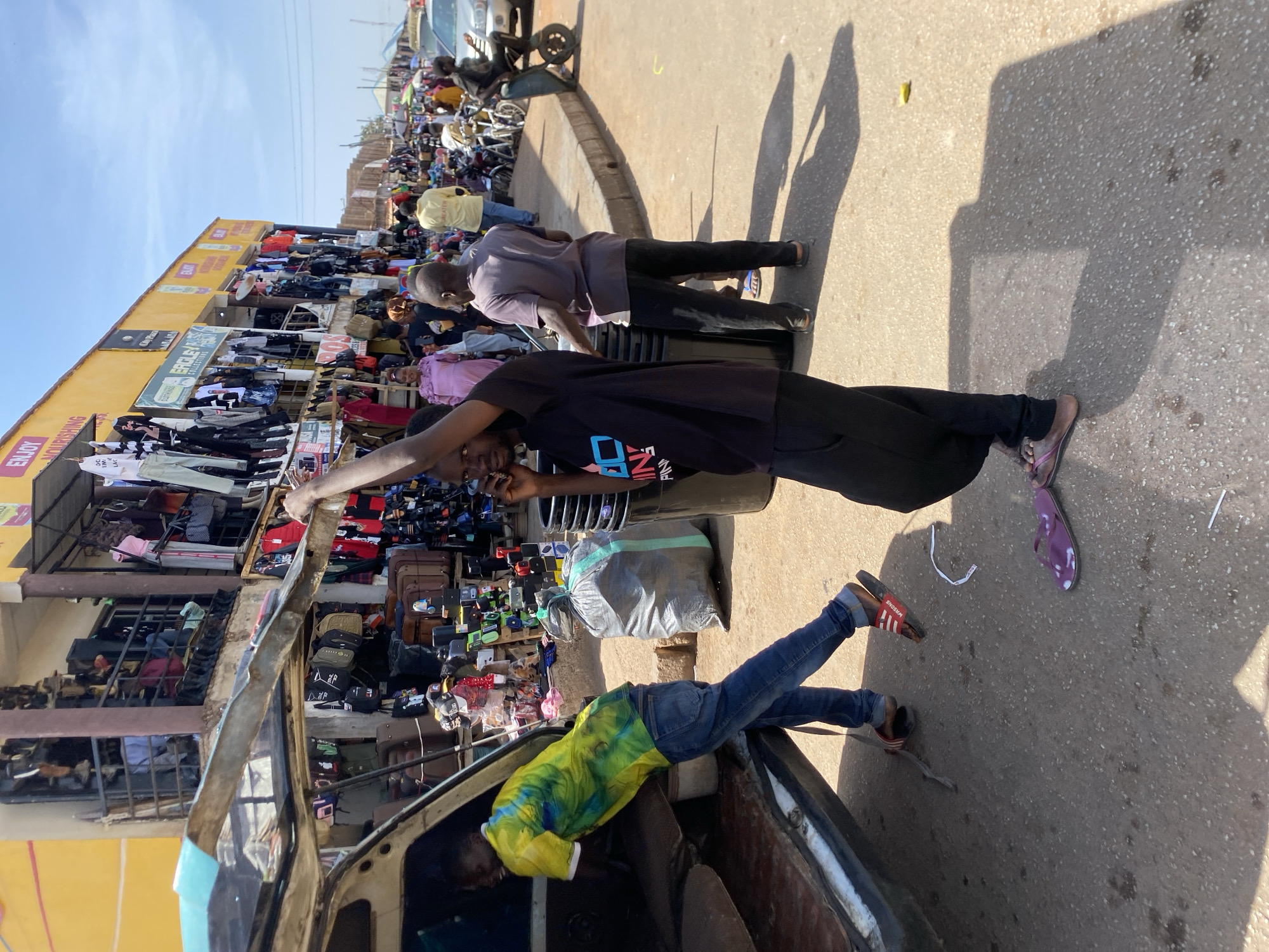 Daily life unfolds in Bukuru Nigeria's bustling midday markets