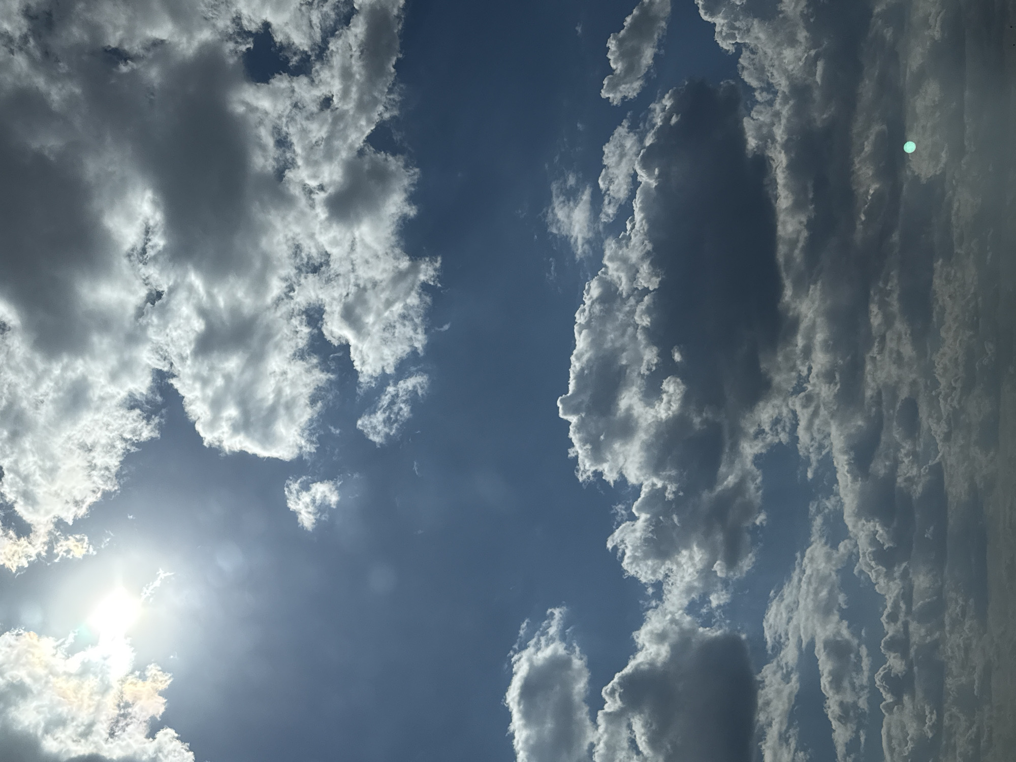 Resident documents cloudy skies, buildings in Lyubertsy, Russia
