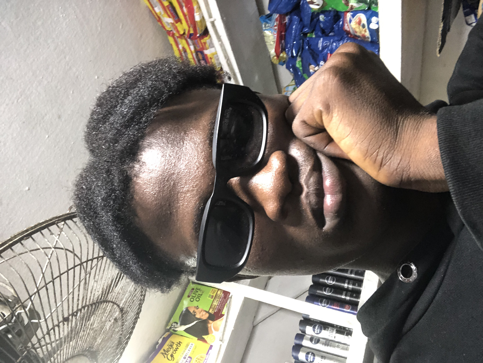 Selfie session inside a small convenience store in Ado, Nigeria
