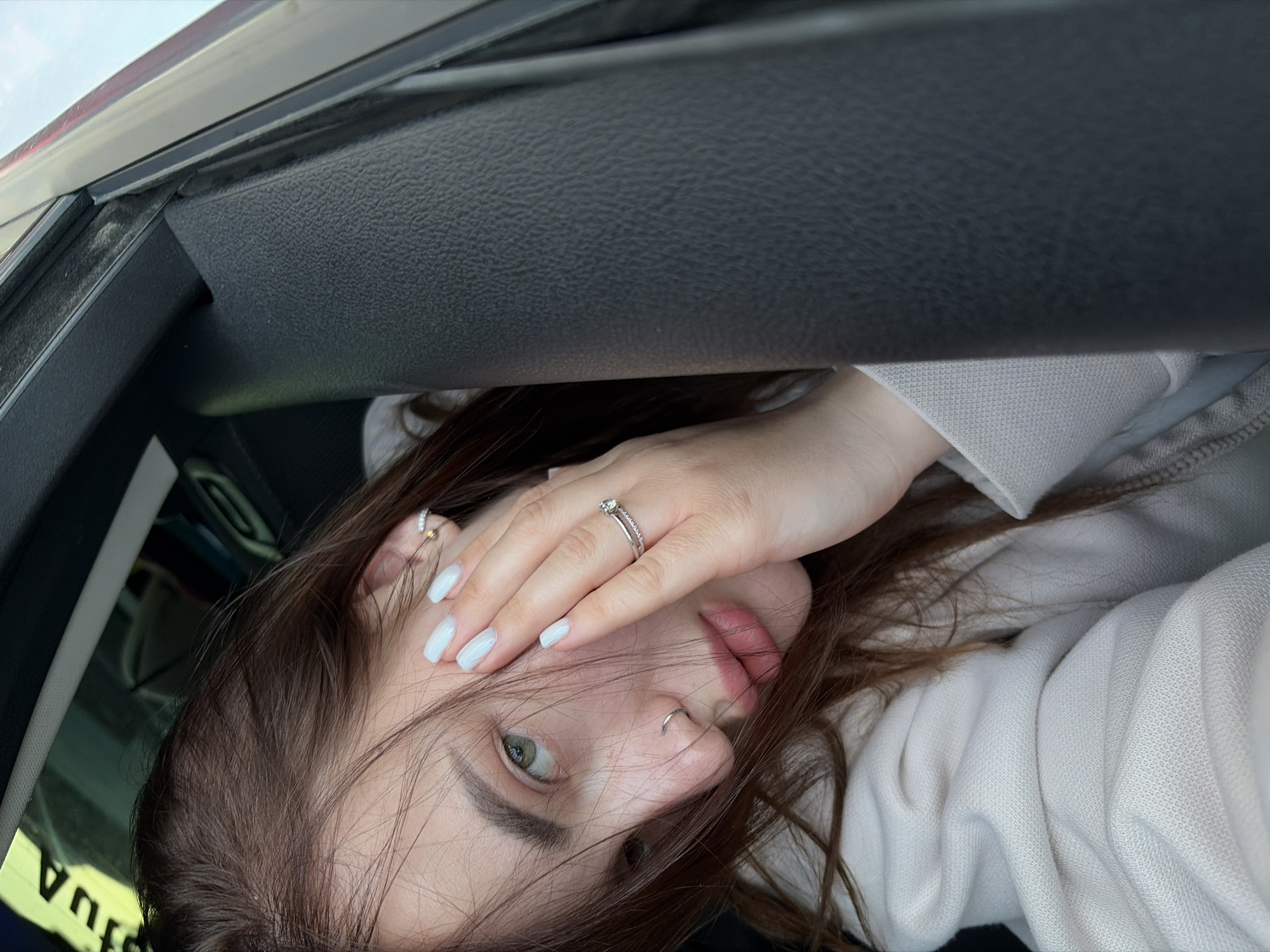 Woman takes selfies in car in Krasnodar, Russia