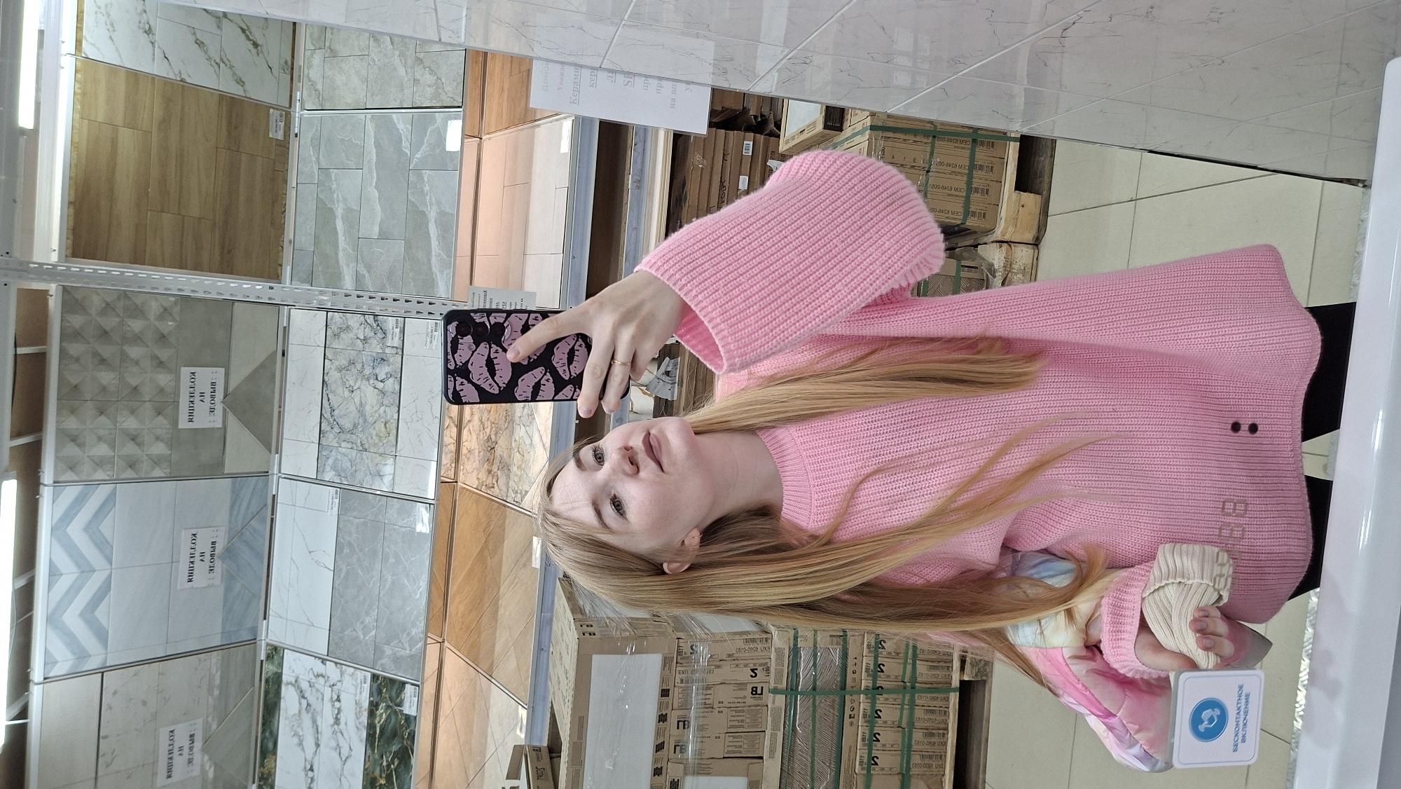 Woman documents shopping trip through Russian home improvement store