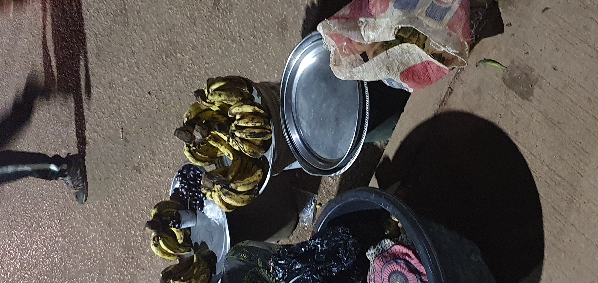 Bukuru street market buzzes with vendors, keke traffic, and nightlife